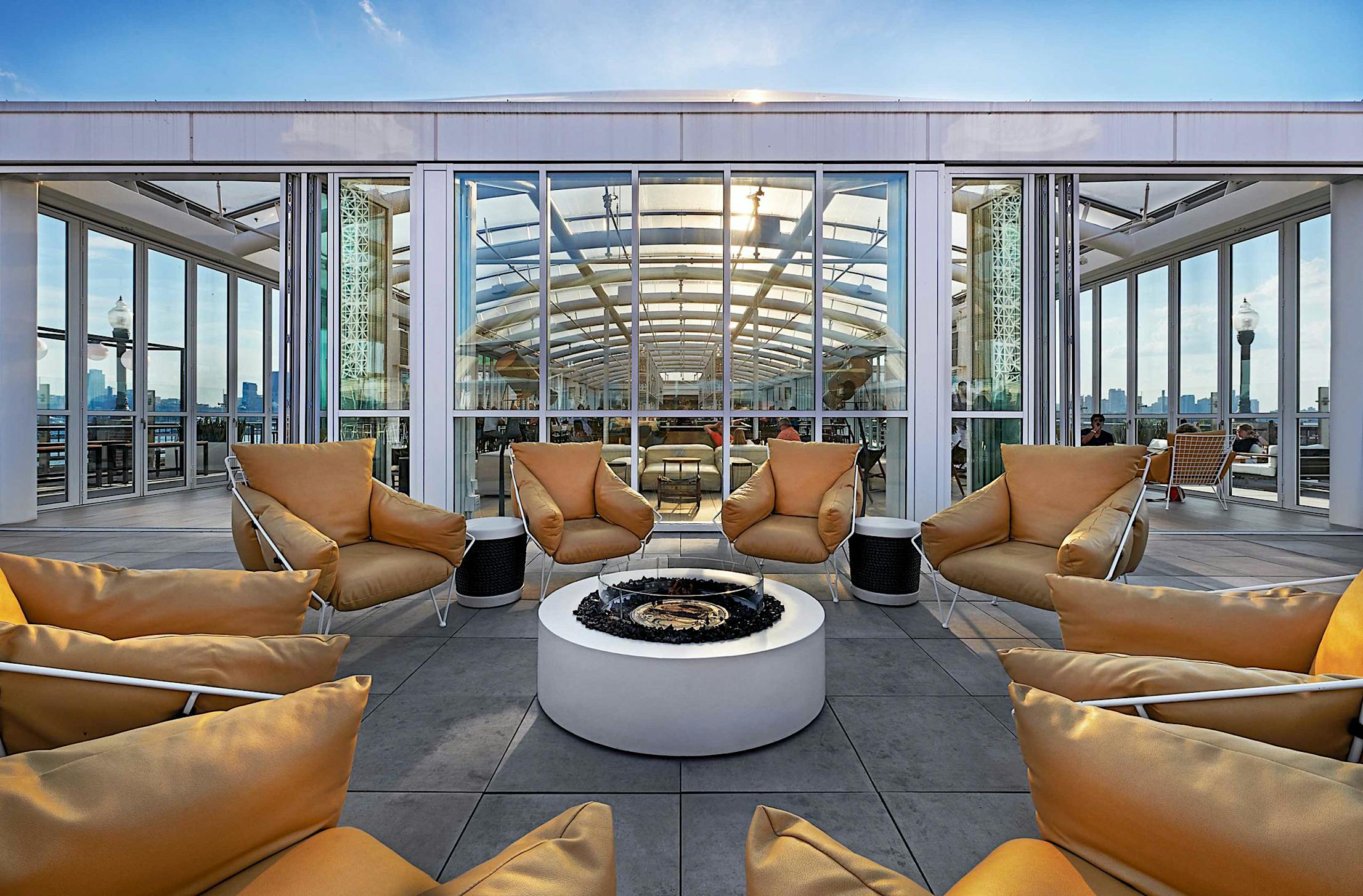 commercial folding glass walls in the best rooftop bars of north america