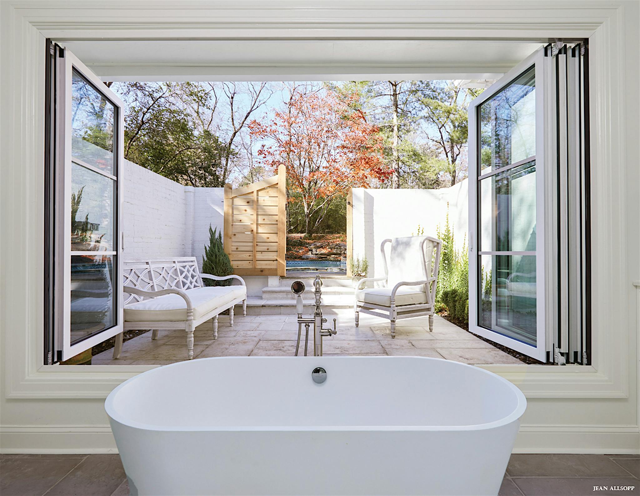 indoor outdoor bathtub with retractable glass doors
