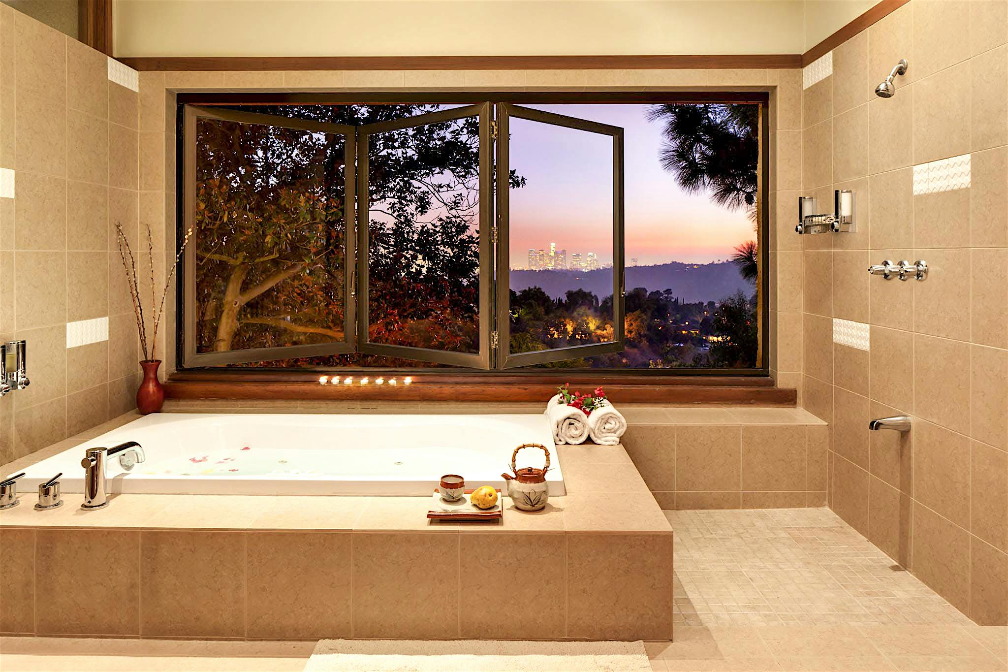 retractable glass windows in bath design