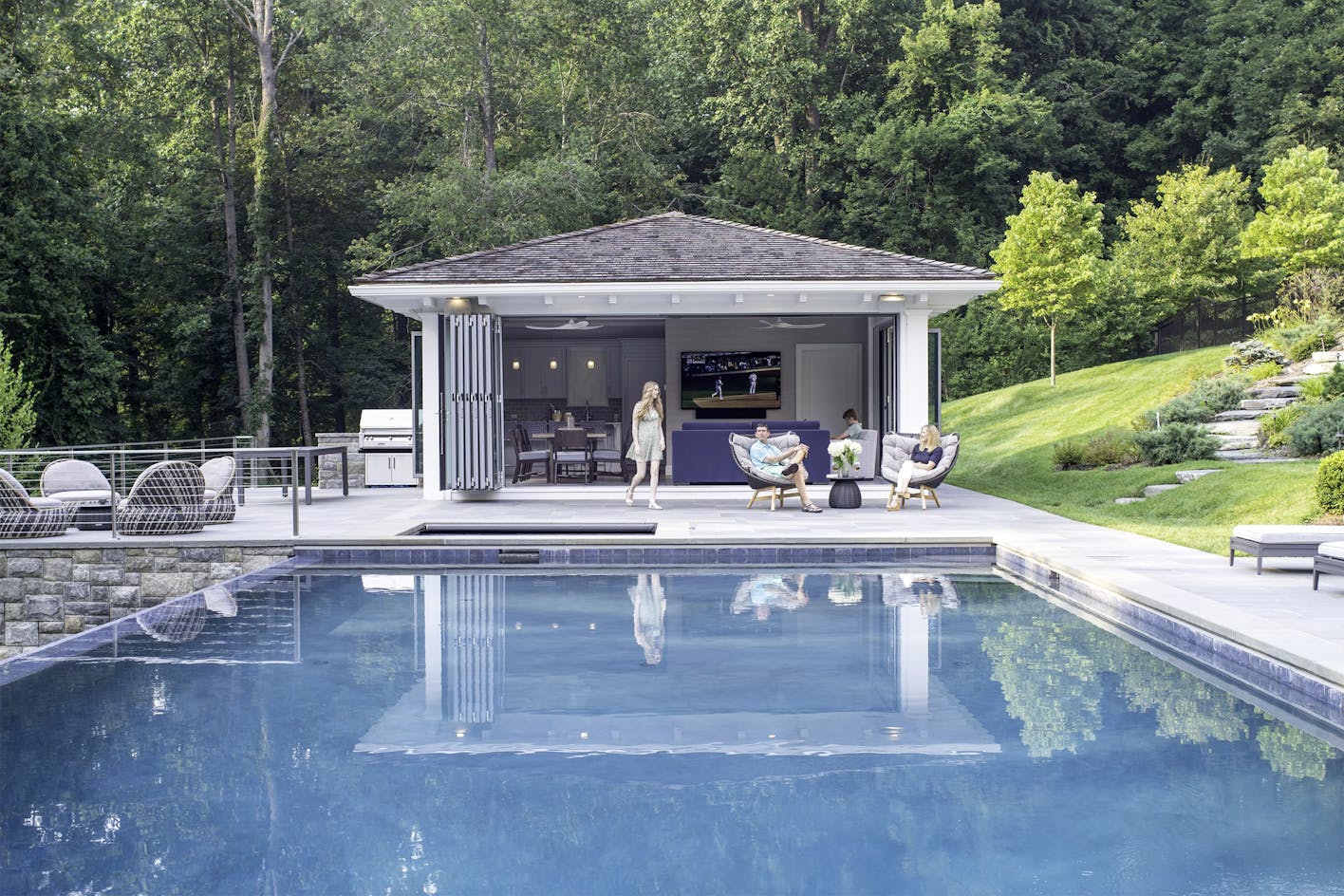 NanaWall folding glass wall systems in pool house design