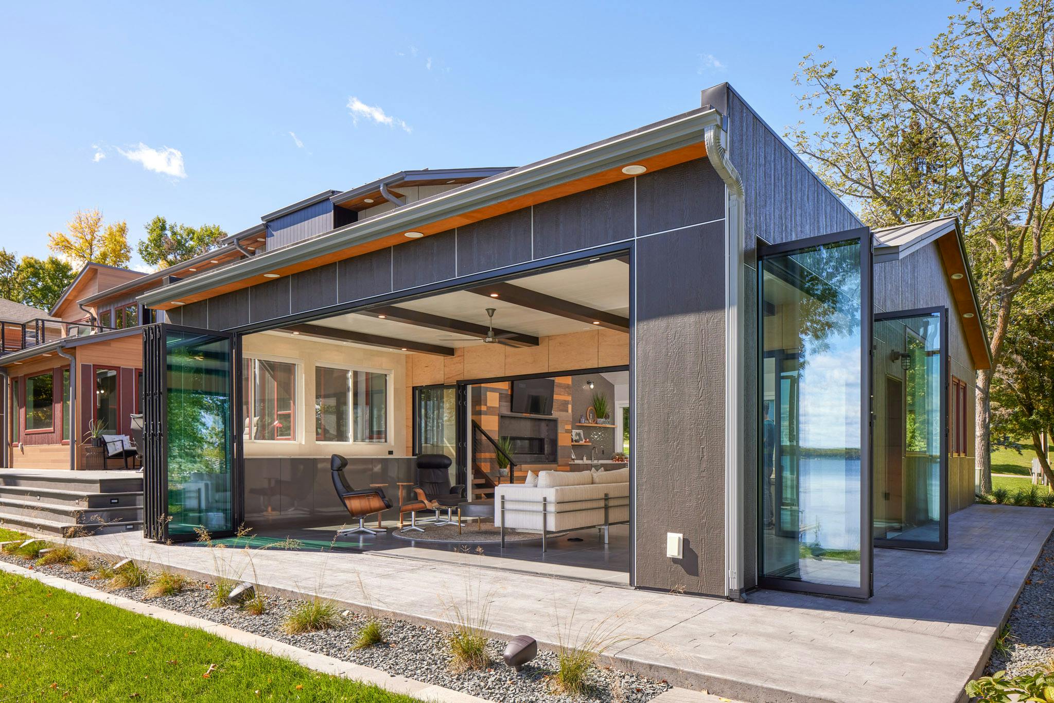 Generation 4 Folding Glass Walls by NanaWall open to the outdoors