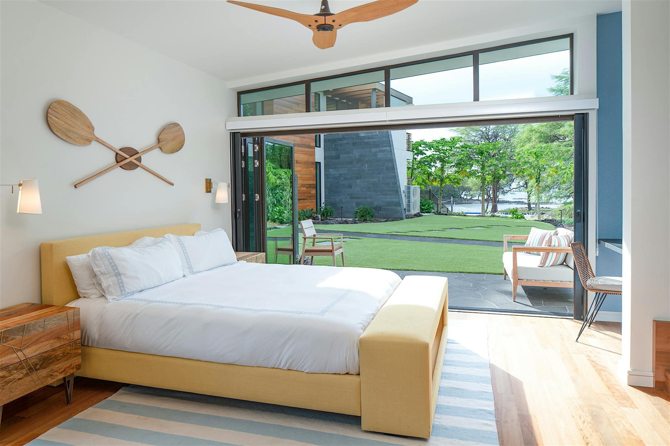Airbnb bedroom with residential glass walls