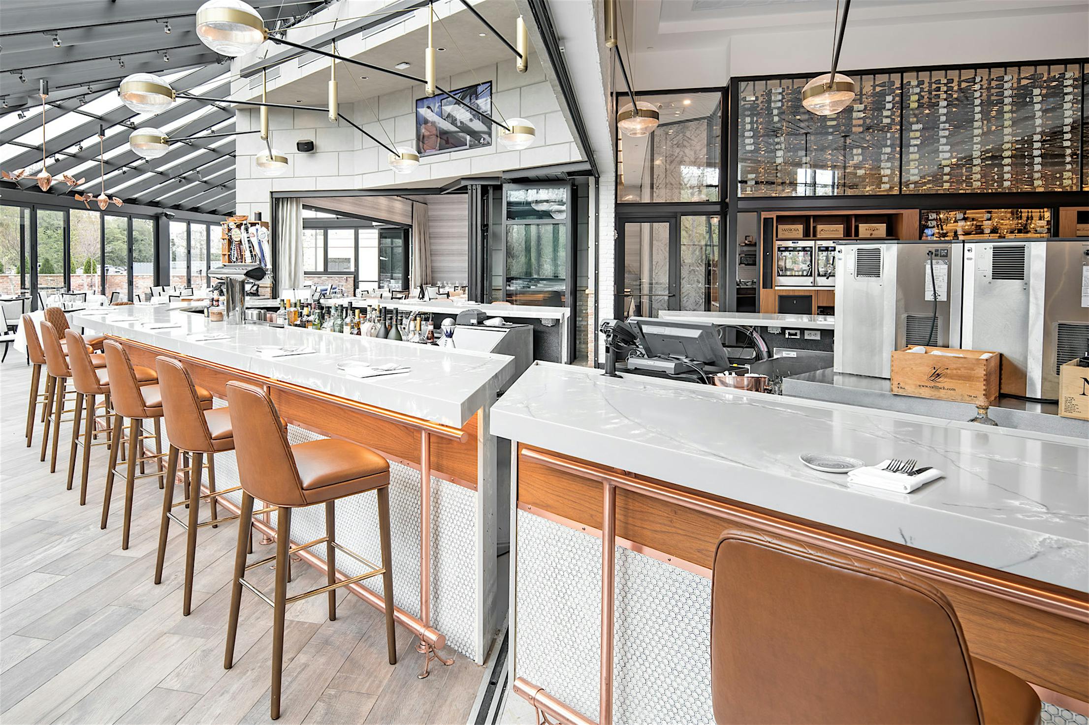 sliding glass wall bisects bar