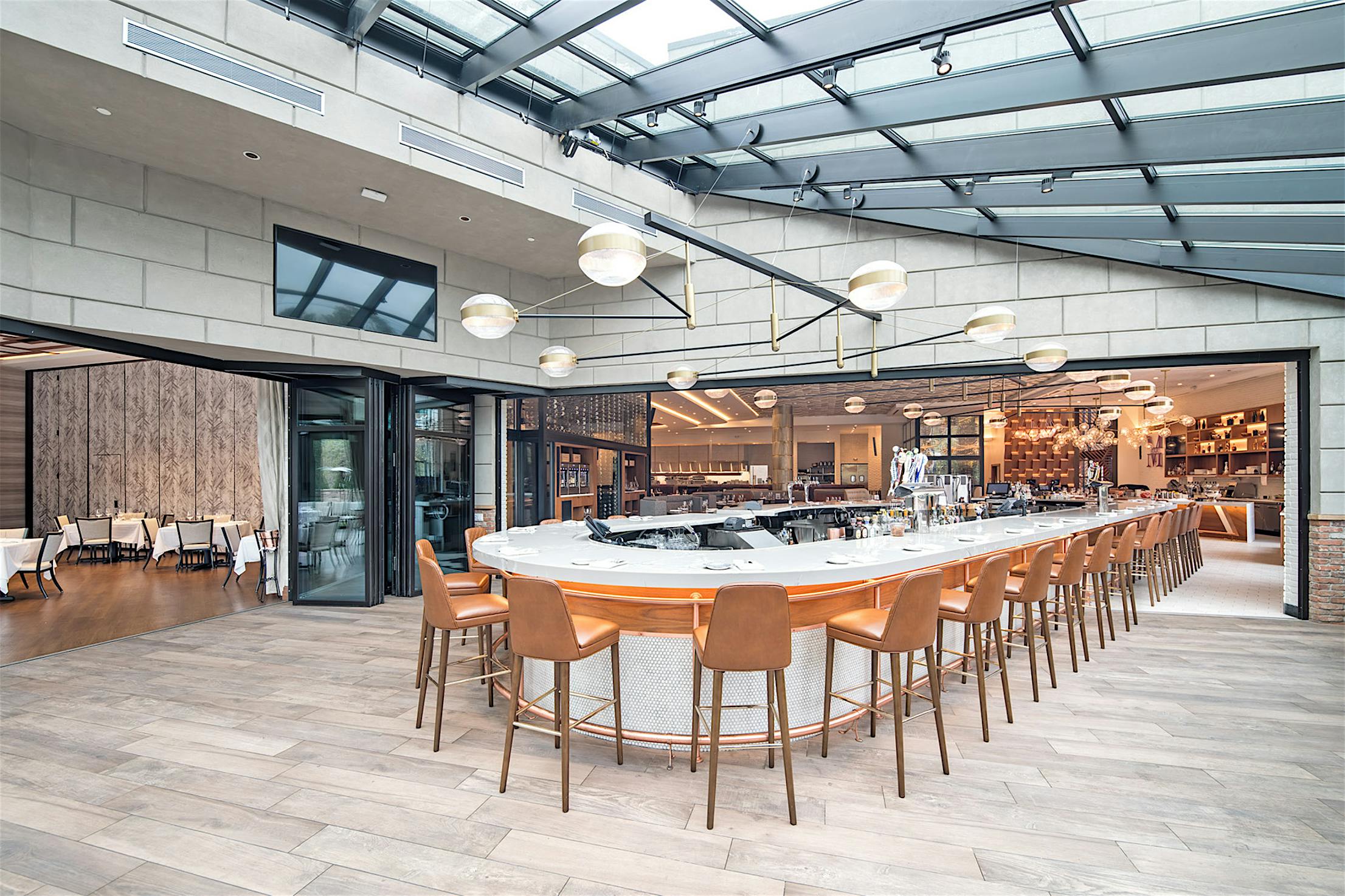 moveable glass walls create indoor outdoor bar