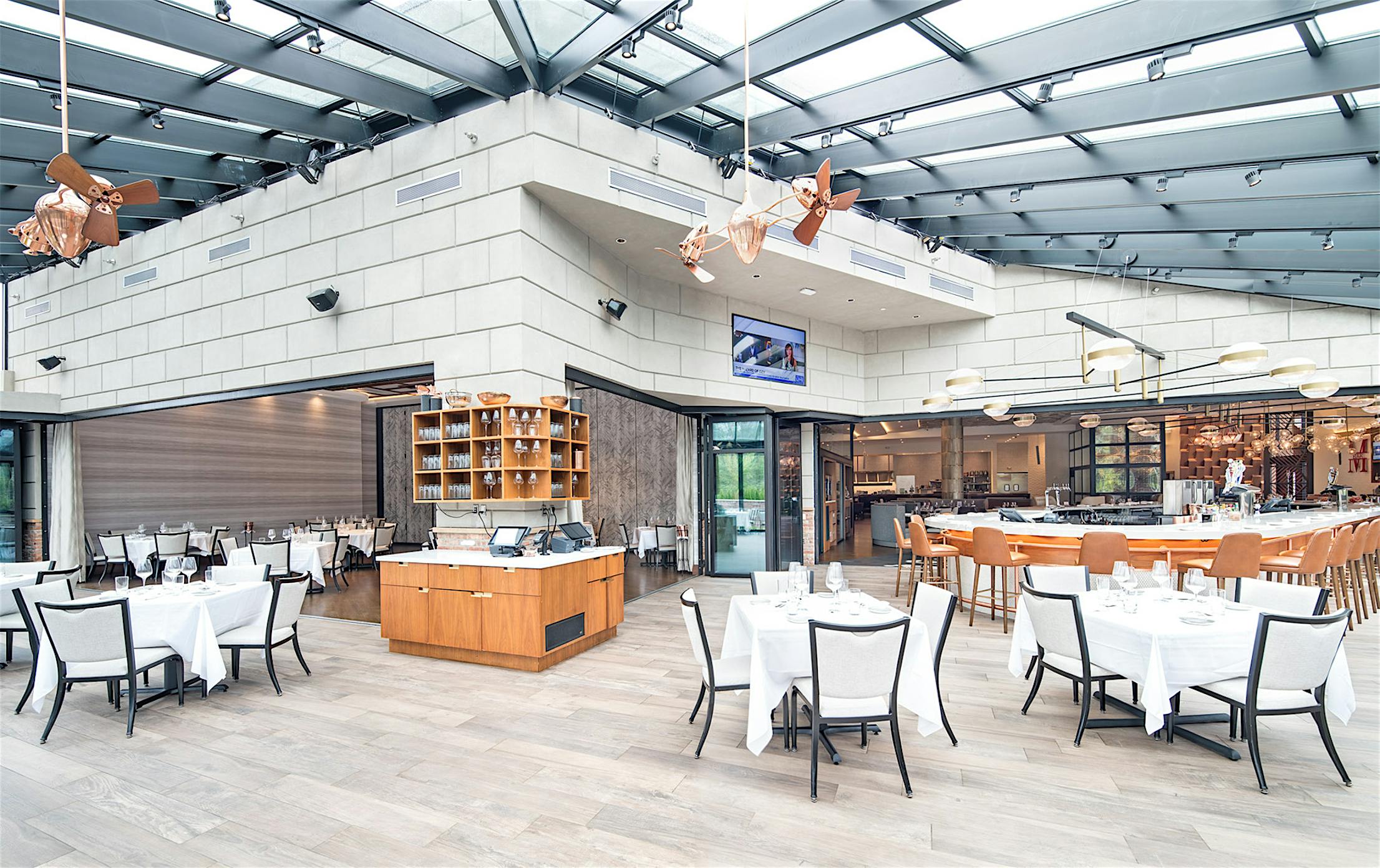 indoor outdoor dining with sliding glass wall design