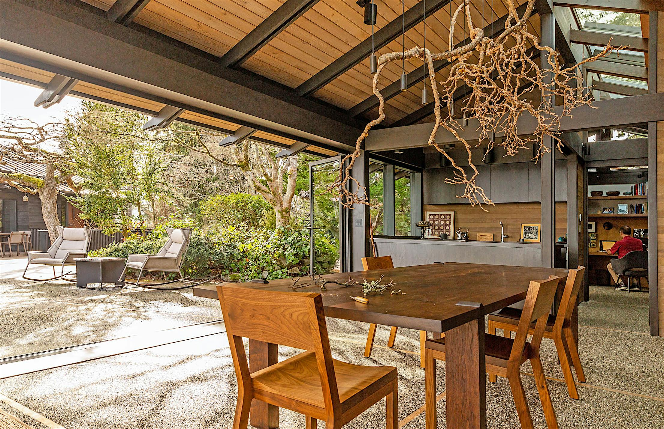 multifunctional space with bifold glass walls