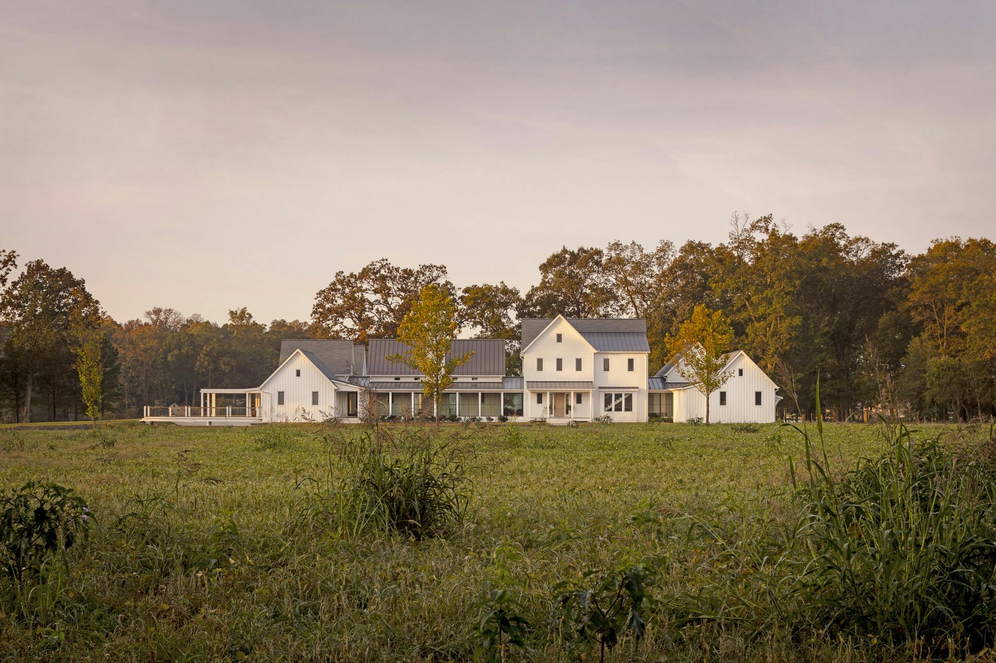 modern farmhouse design with folding glass walls