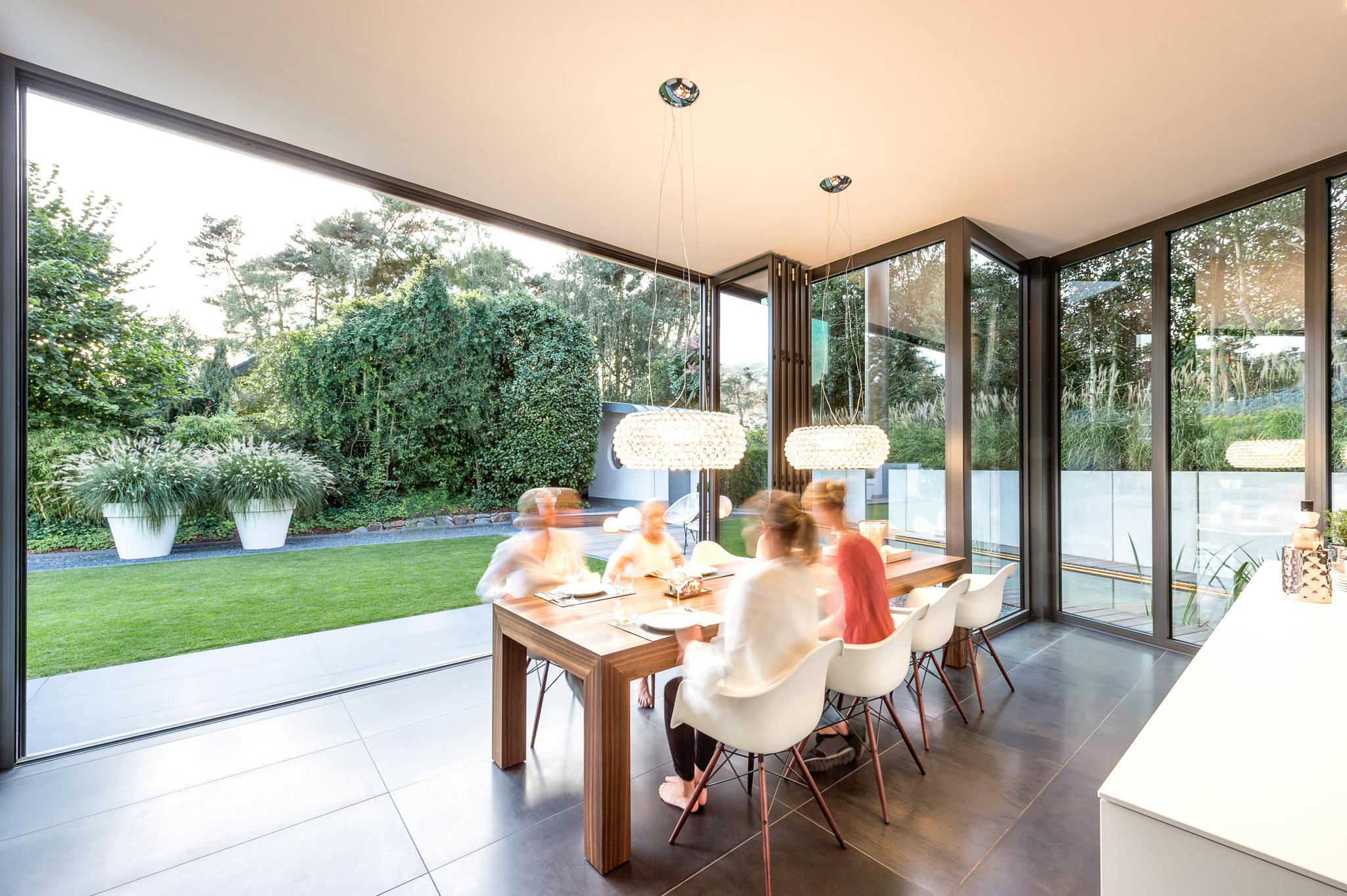 indoor outdoor dining with NanaWall folding glass patio doors