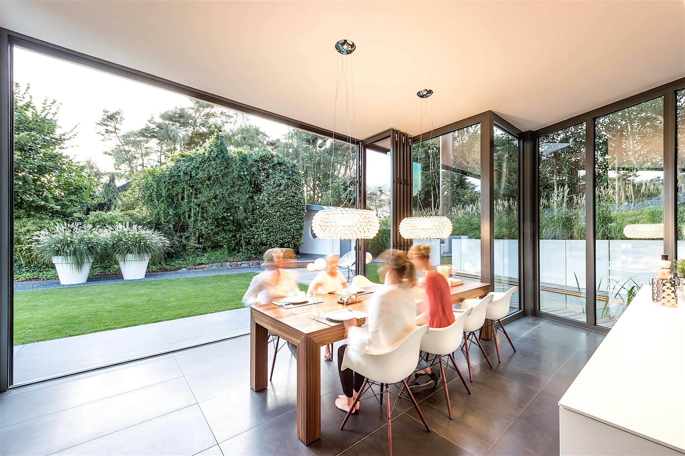 indoor outdoor dining with NanaWall folding glass patio doors