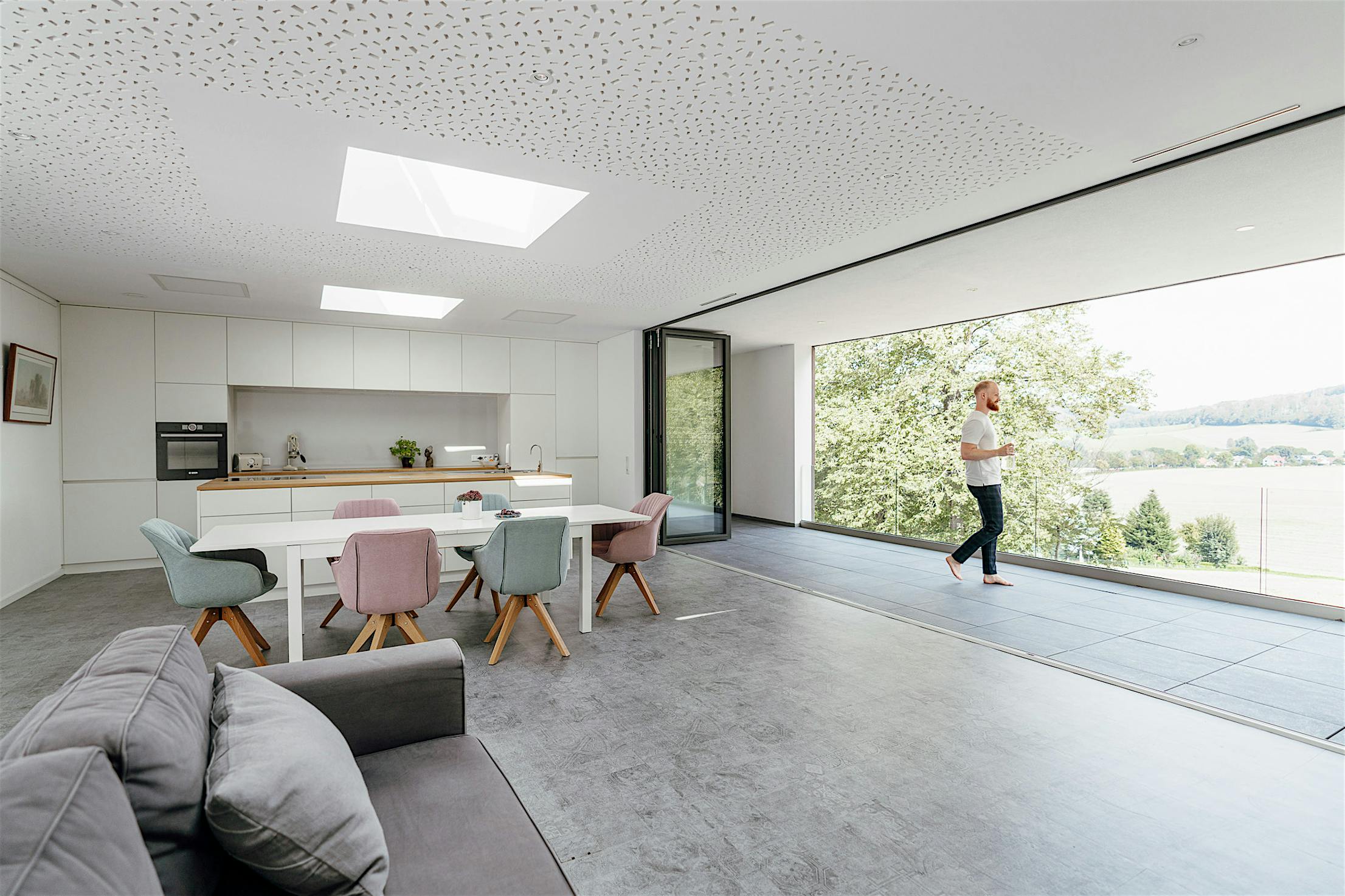 multifunctional approach to living with retractable glass walls