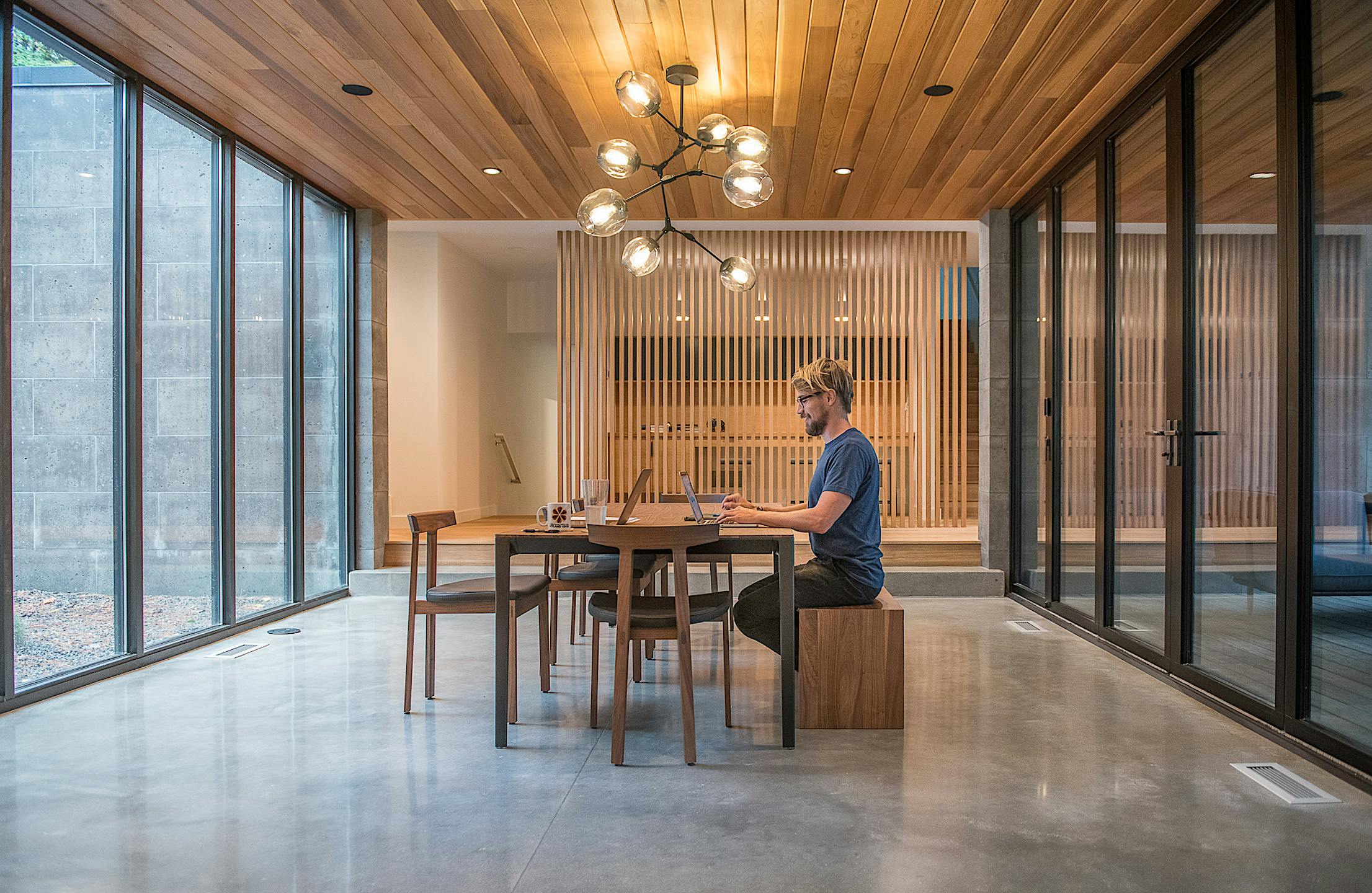 folding glass patio doors create home office space in dining room