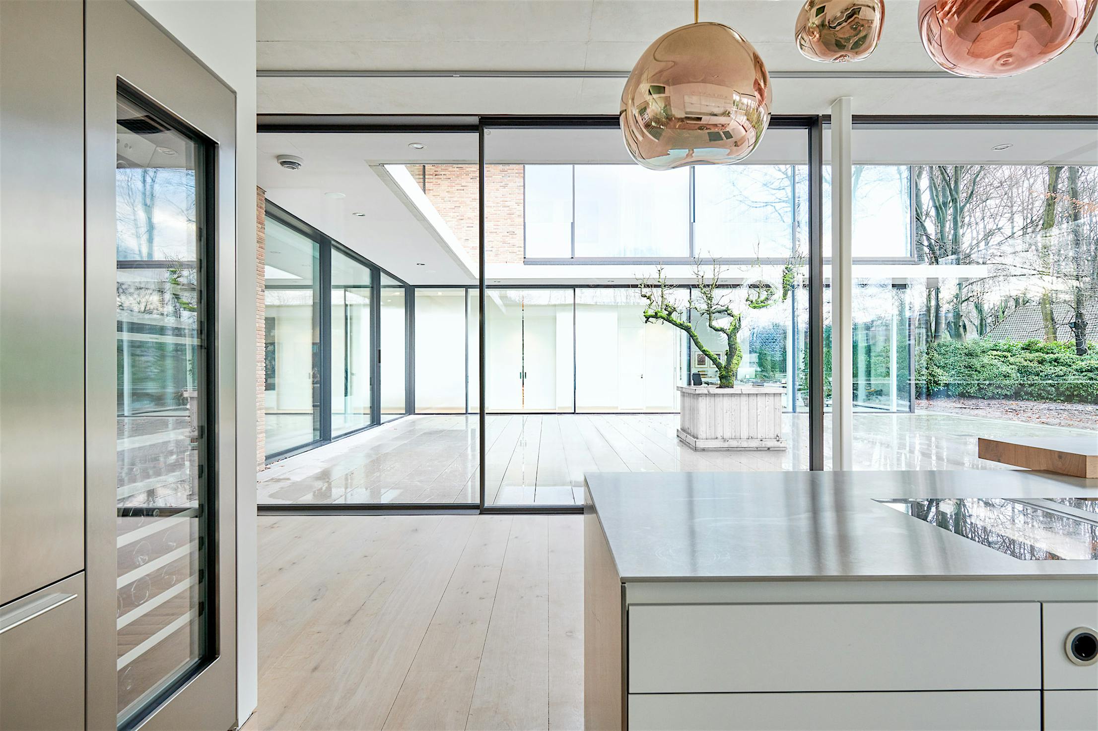 minimal sliding glass walls in residential design