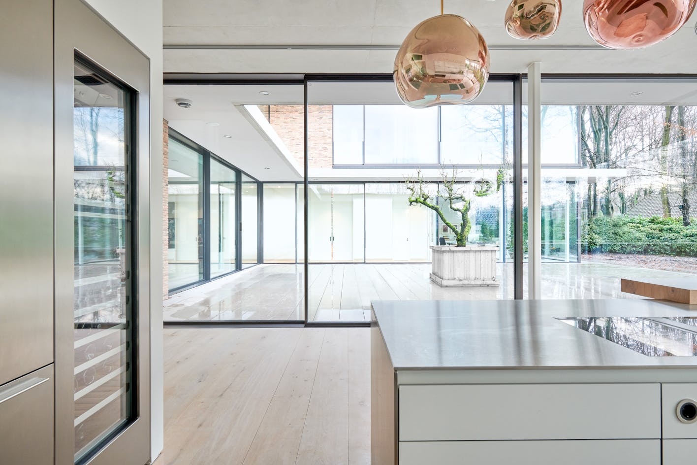 minimal sliding glass walls in residential design