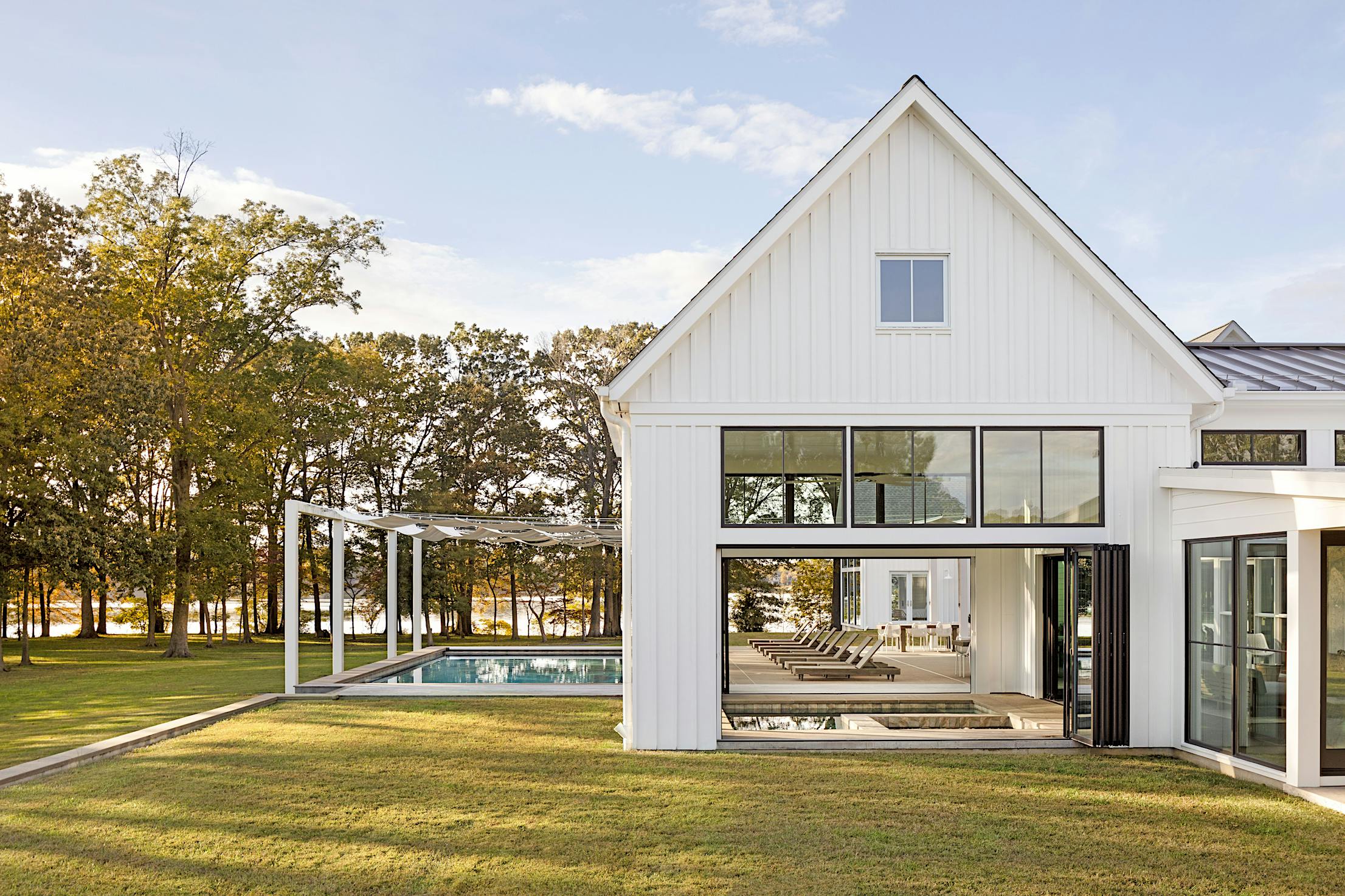 modern farmhouse design with operable glass walls