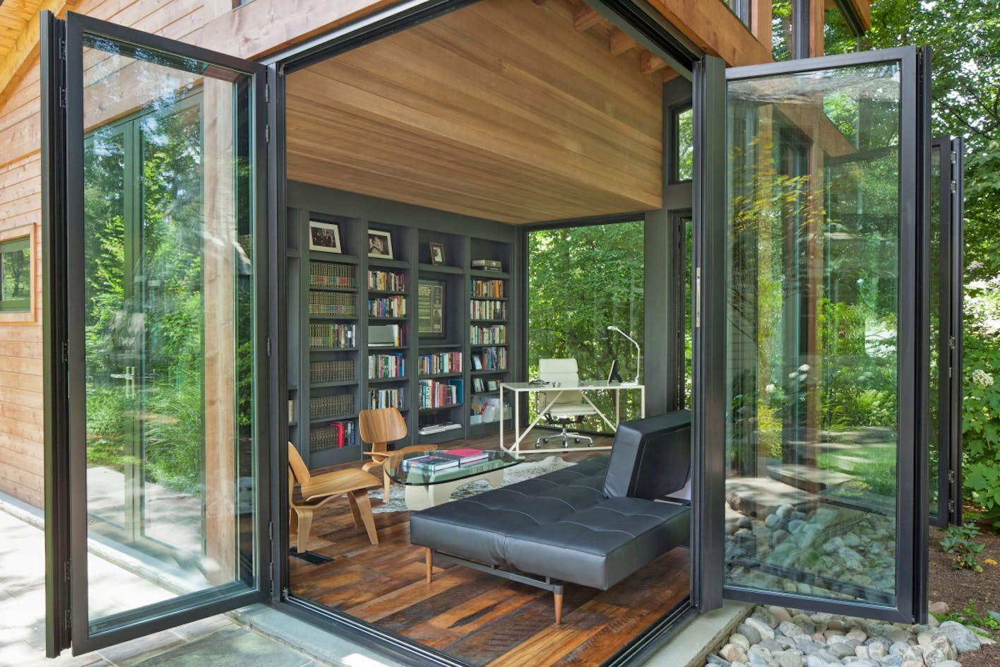 accessory dwelling unit with folding glass walls