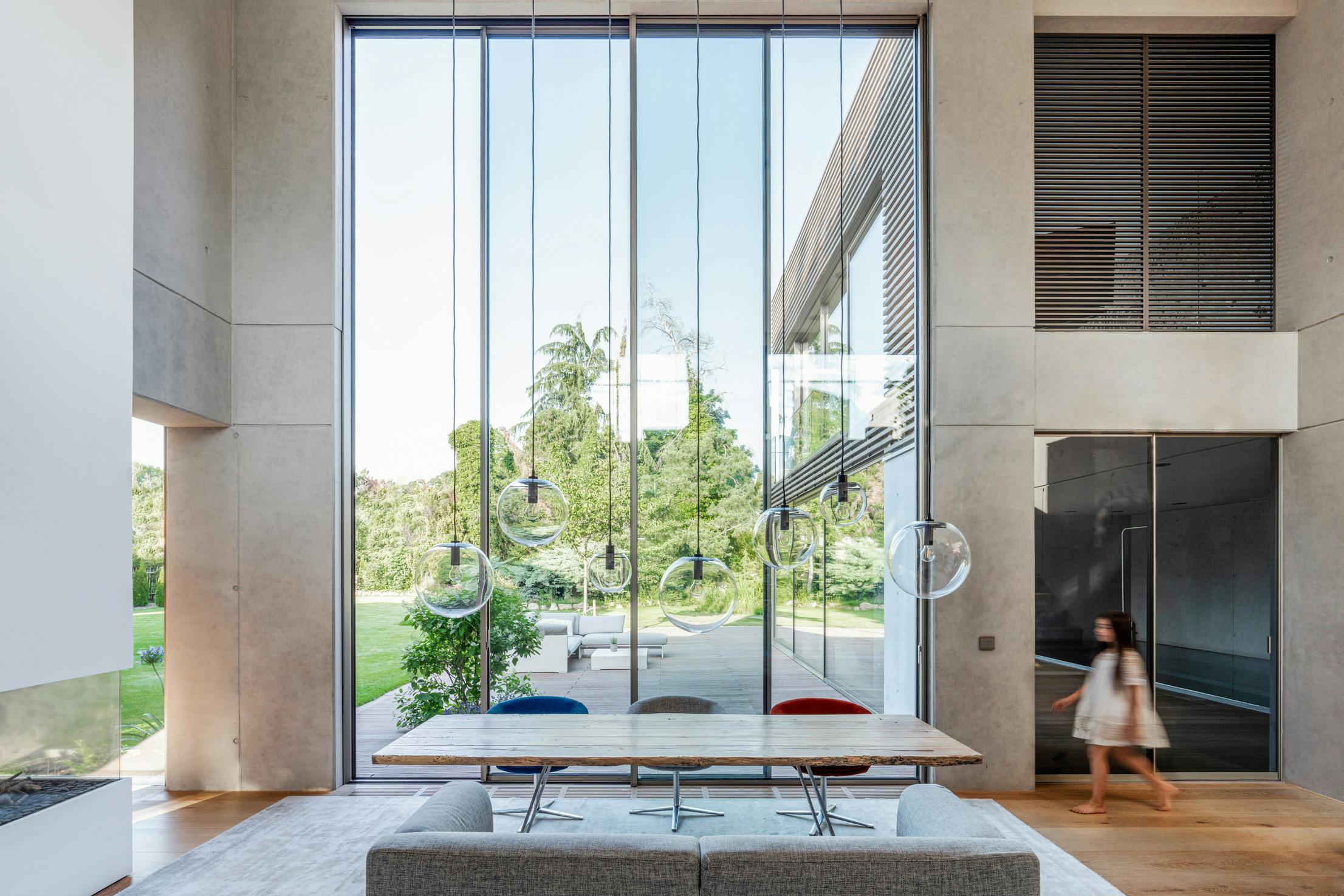 Explore the Transformative Nature of Floor-to-Ceiling Glass Walls