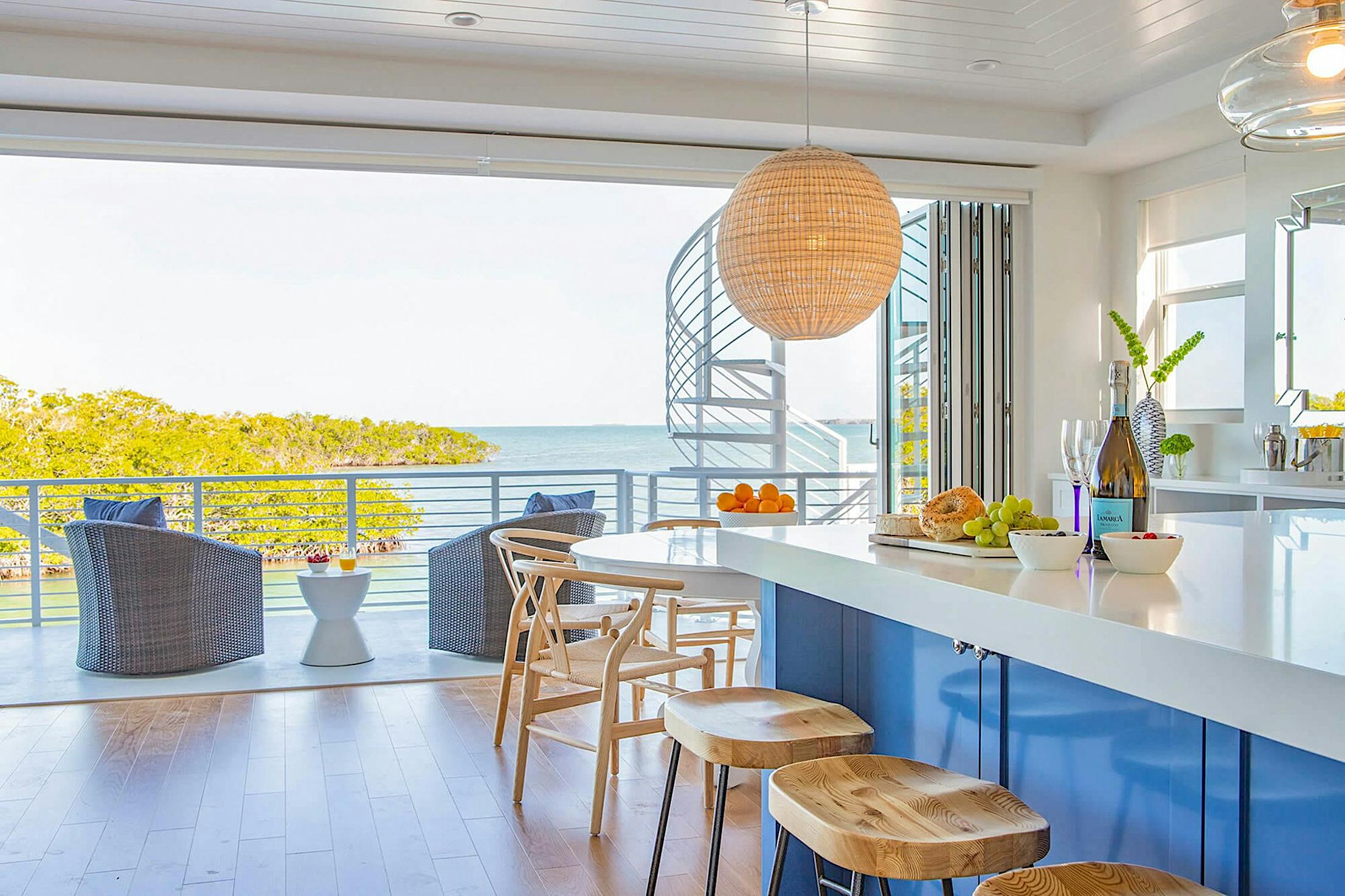 hurricane rated folding glass walls for outdoor living spaces