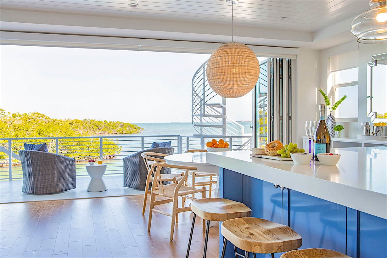 hurricane rated folding glass walls for outdoor living spaces