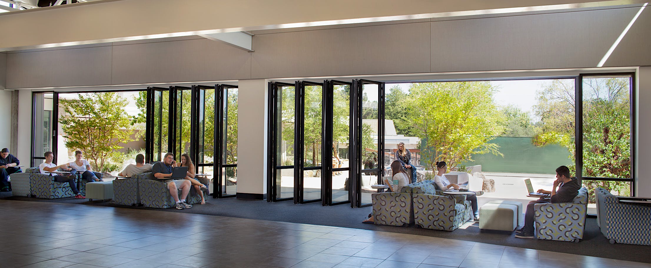 aluminum framed exterior retractable glass walls