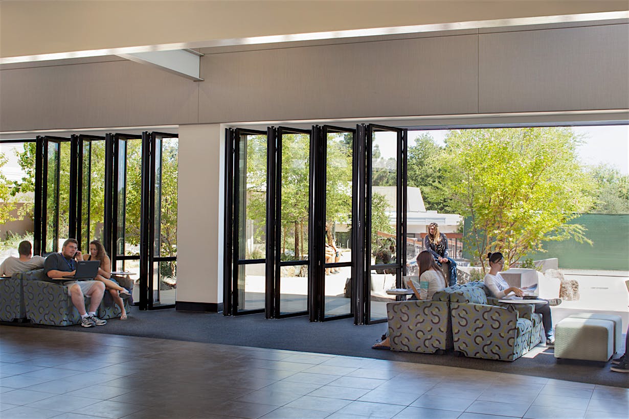 aluminum framed exterior retractable glass walls