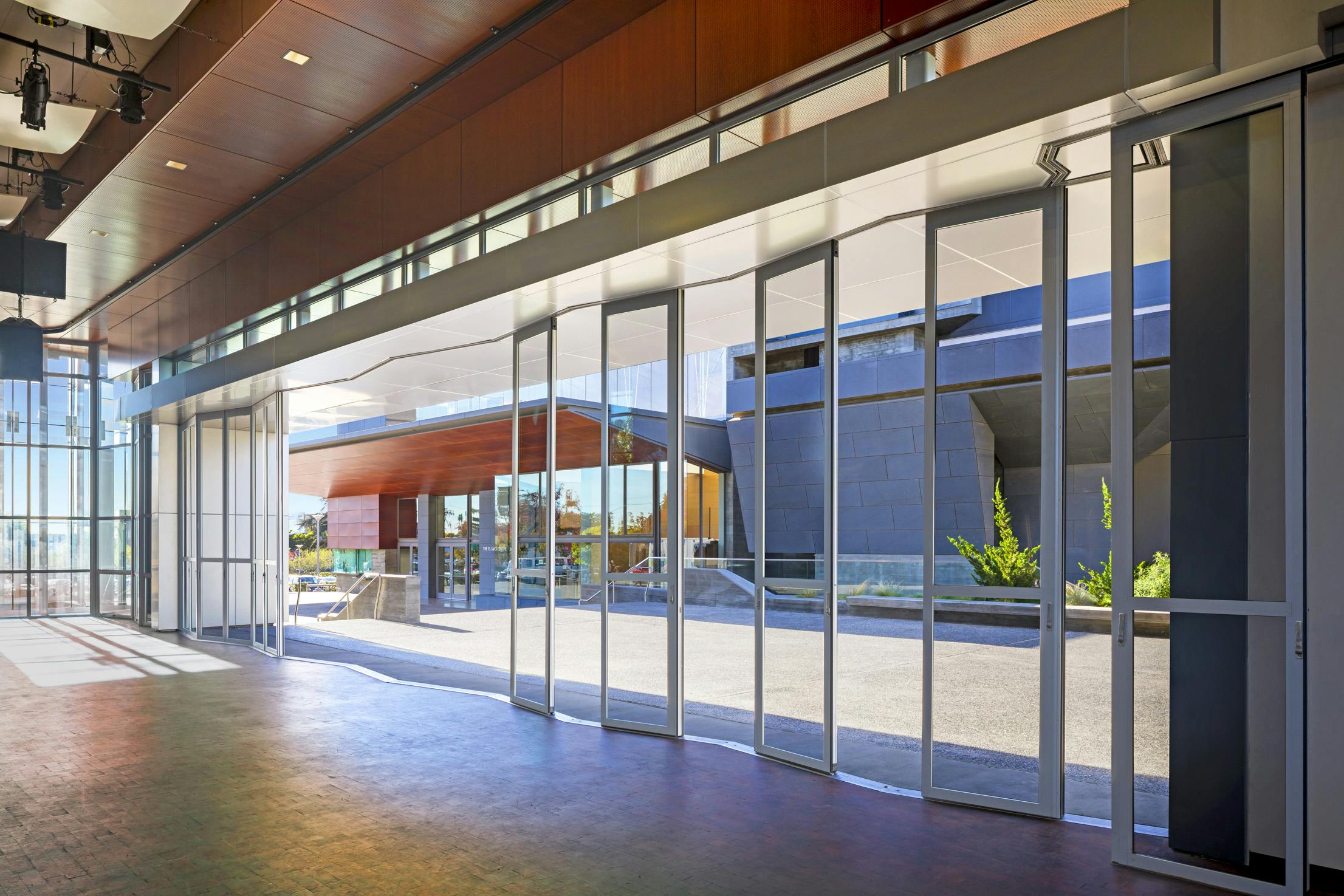 acoustical exterior retractable glass walls by NanaWall