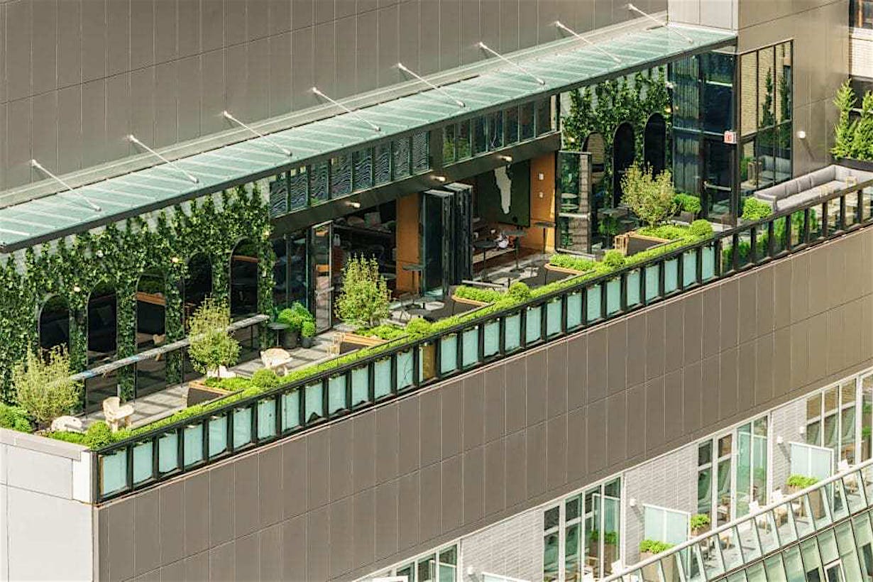 biophilic rooftop design with opening glass walls
