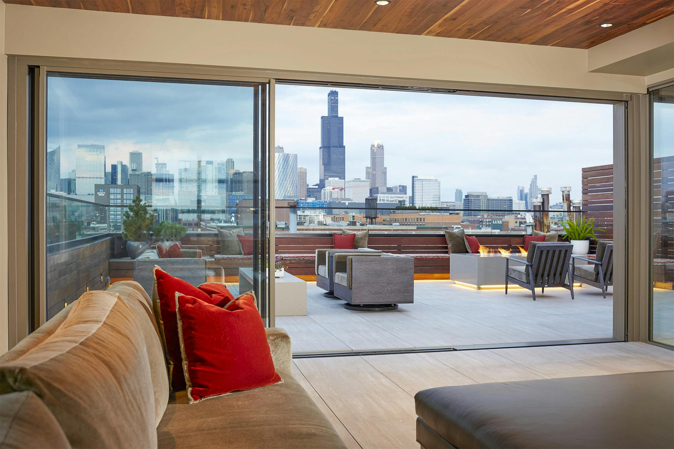 Rooftop Living with Innovative Folding and Sliding Glass Walls
