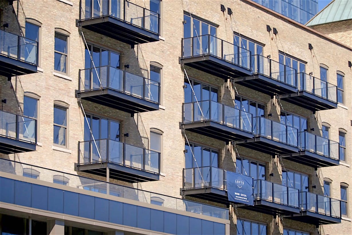 multifamily balcony design with NanaWall folding glass walls