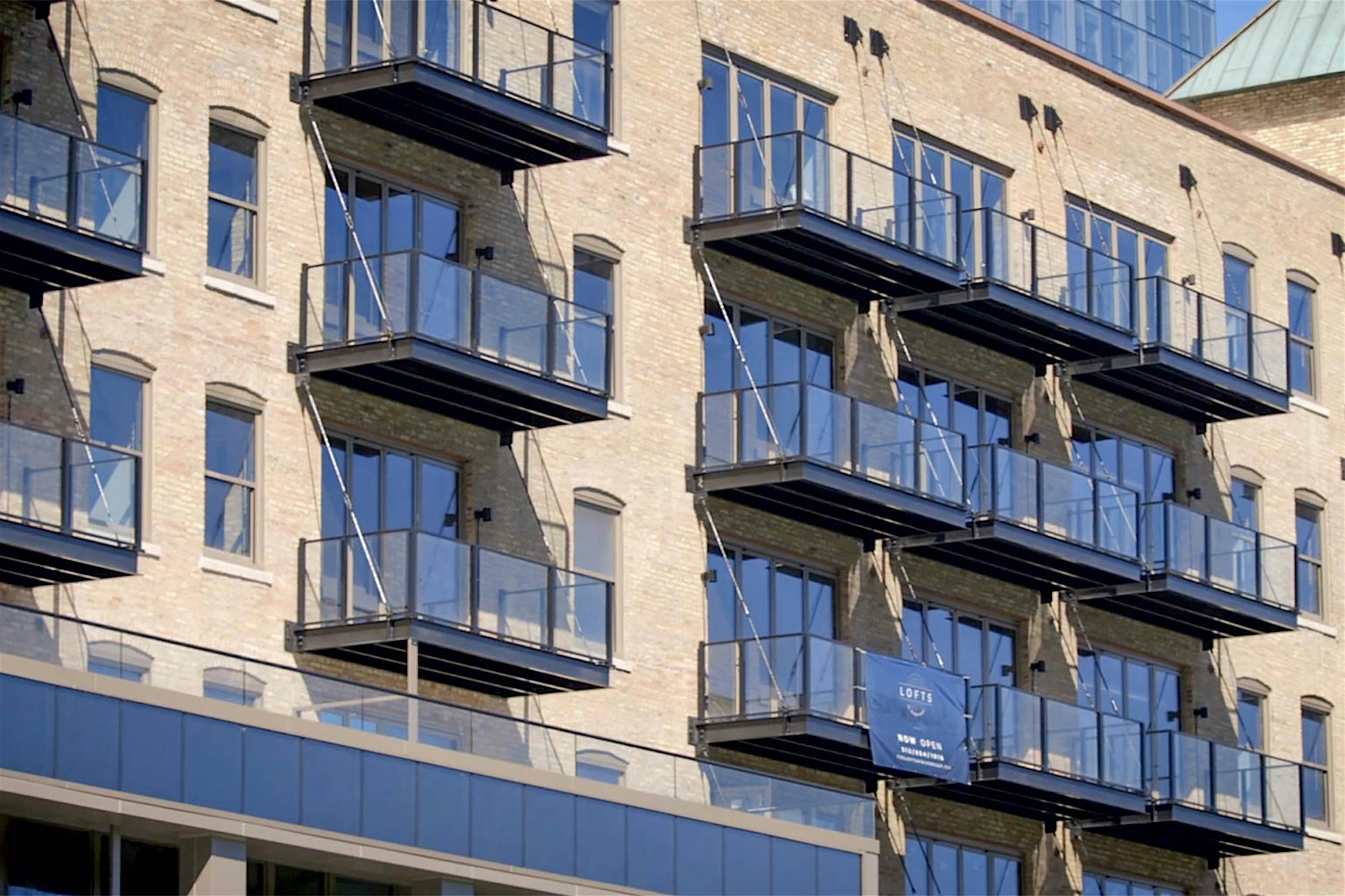 multifamily balcony design with NanaWall folding glass walls