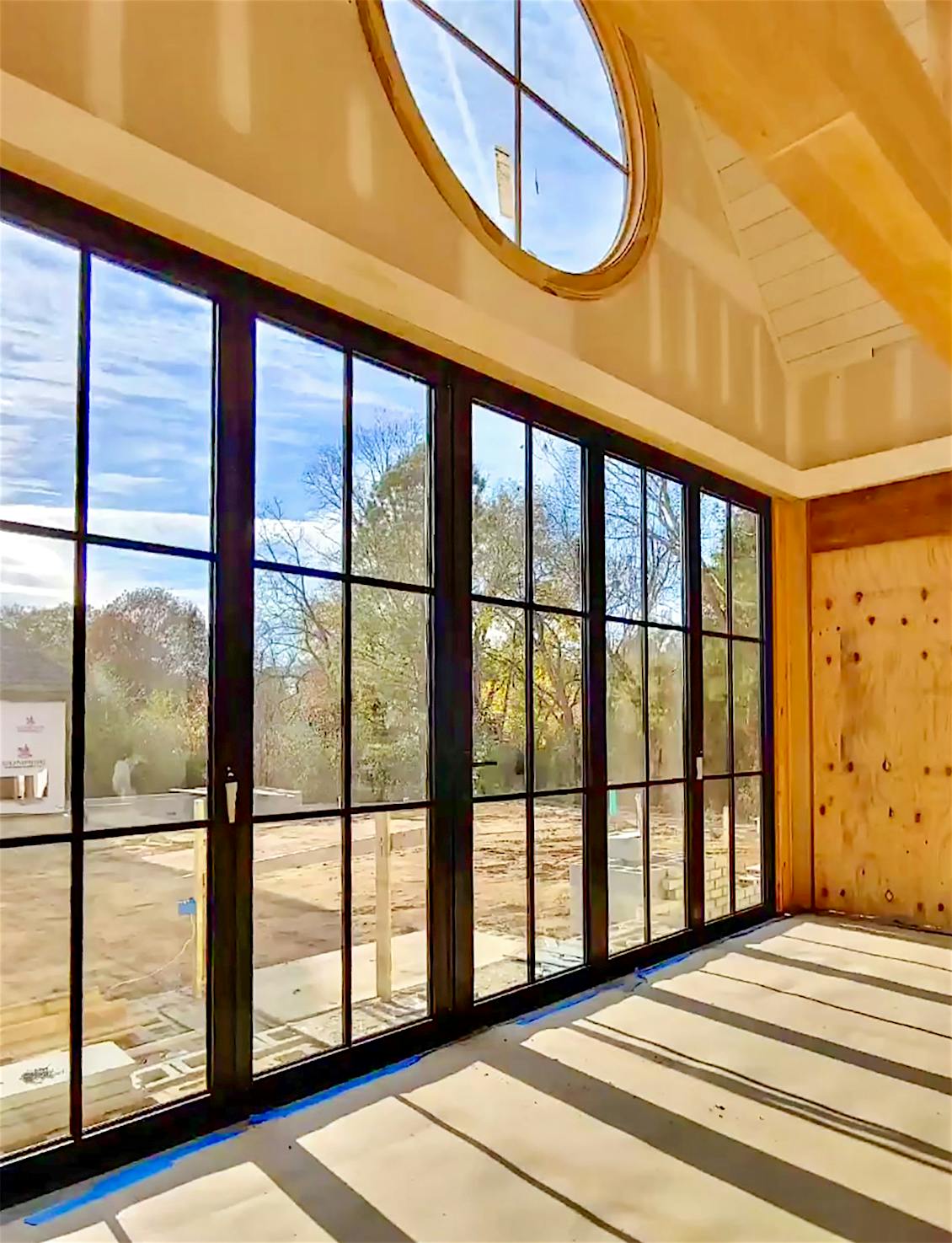 Steel look aluminum folding glass walls