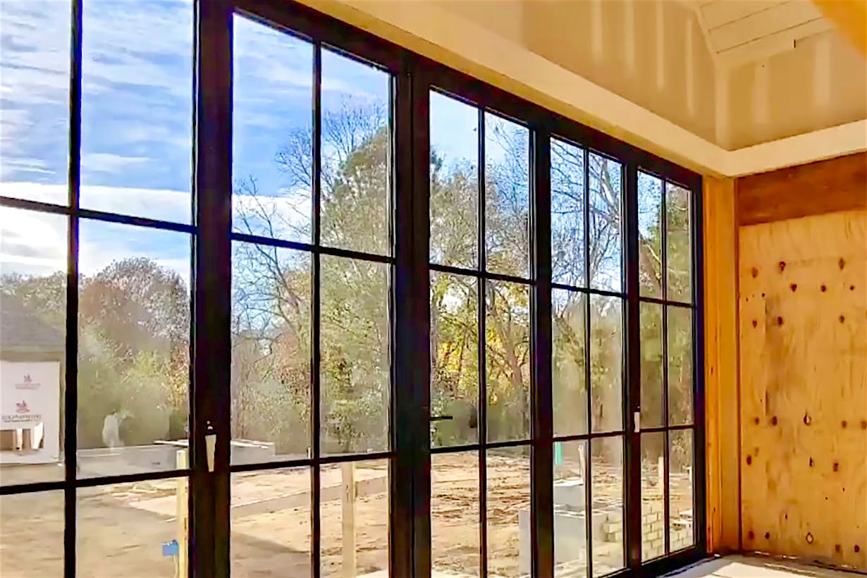 Steel look aluminum folding glass walls