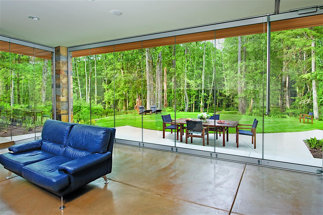 ClimaCLEAR frameless retractable glass walls