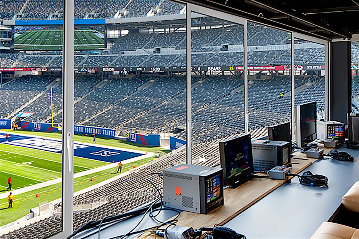 MetLife Stadium press booth stacking glass wall system