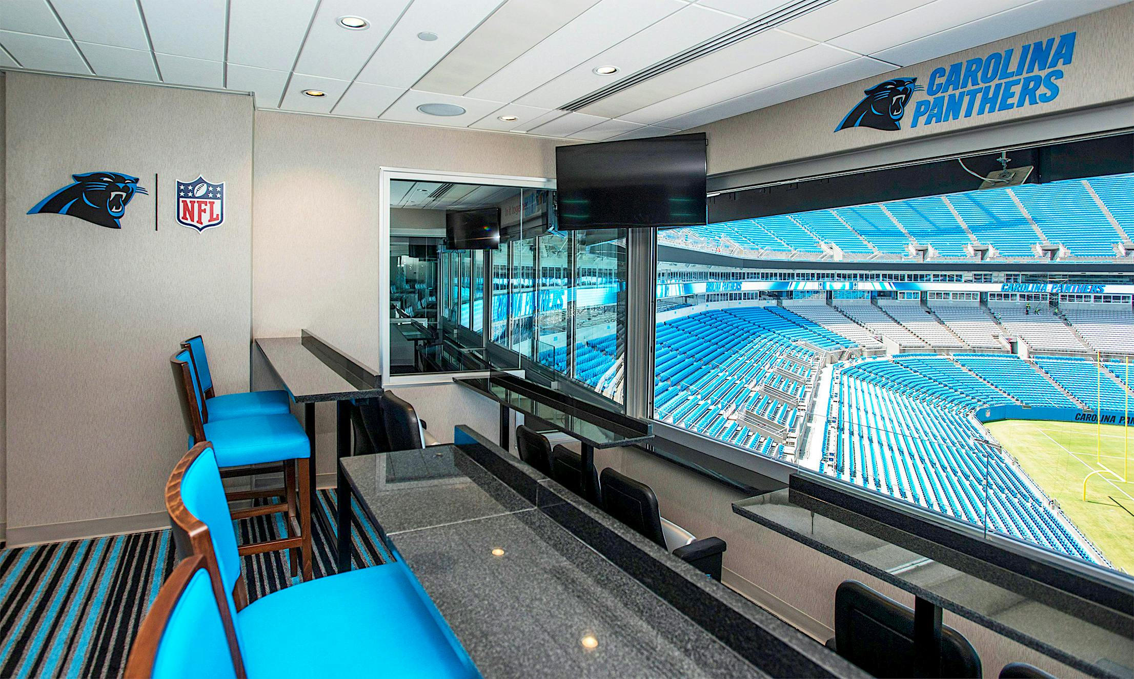 Caorolina Panthers Stadium with NanaWall stacking glass wall systems