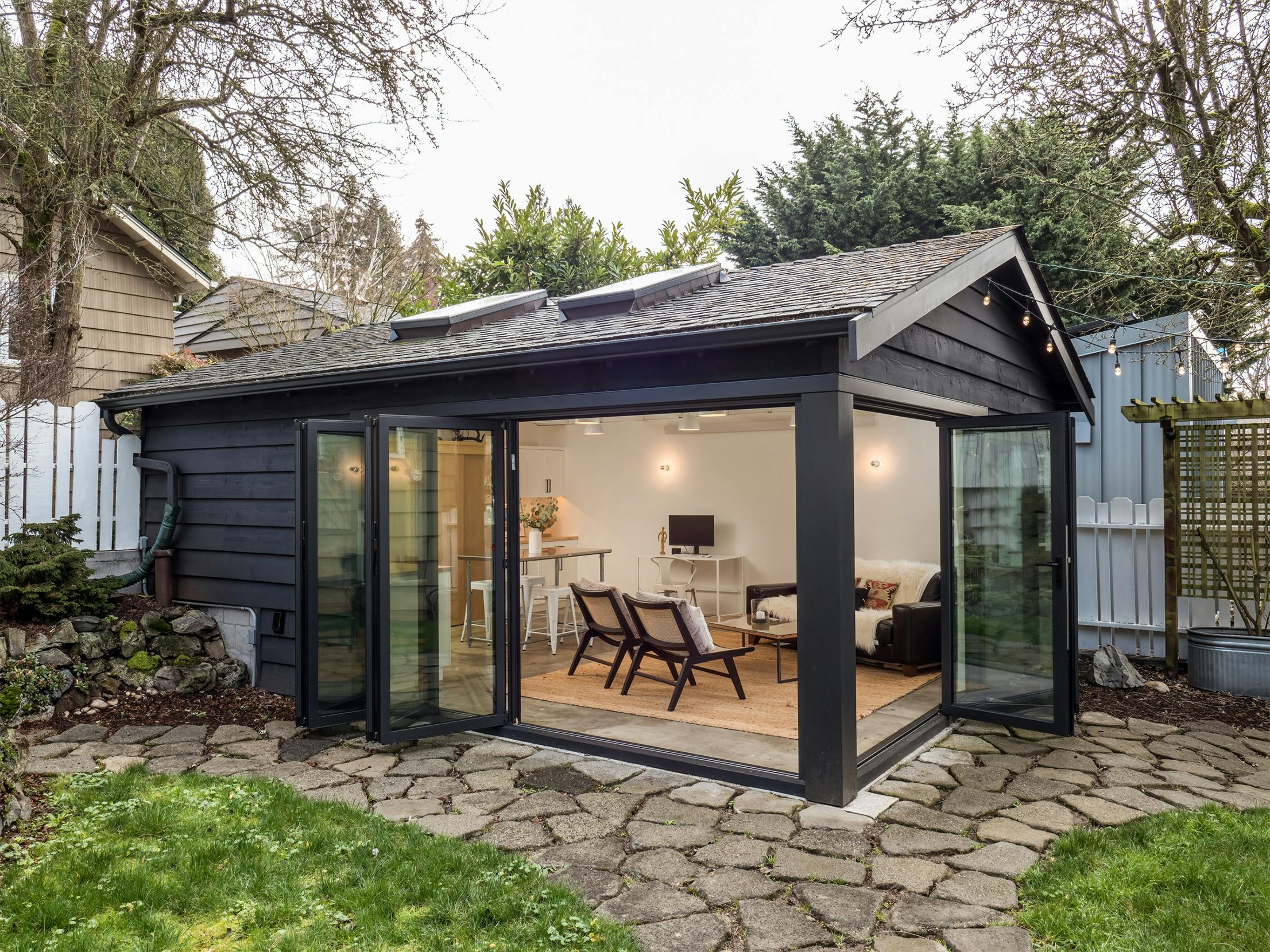 garage conversion with residential folding glass systems