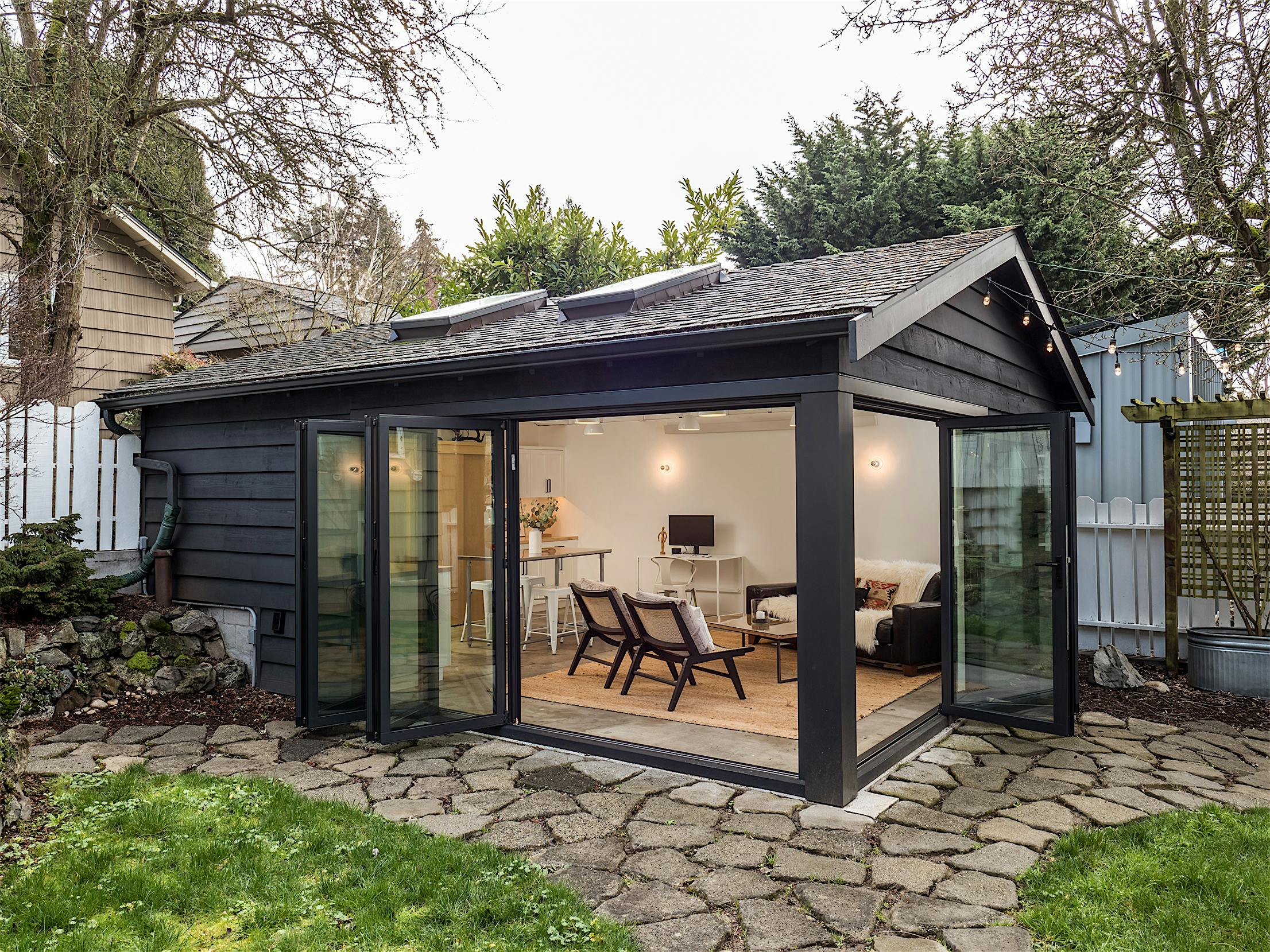 garage conversion with residential folding glass systems