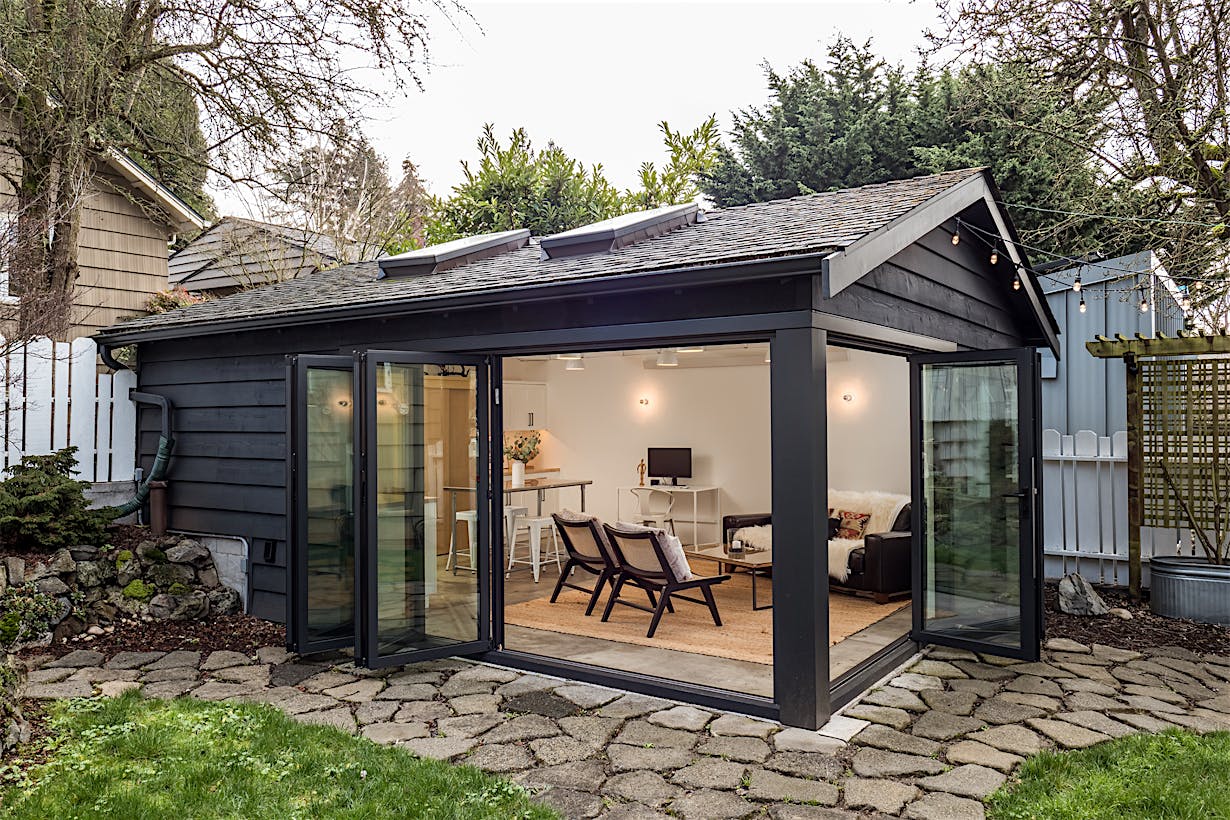 garage conversion with residential folding glass systems
