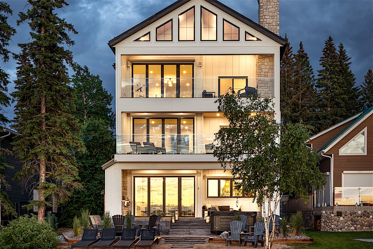 lakefront home design with NanaWall glass walls