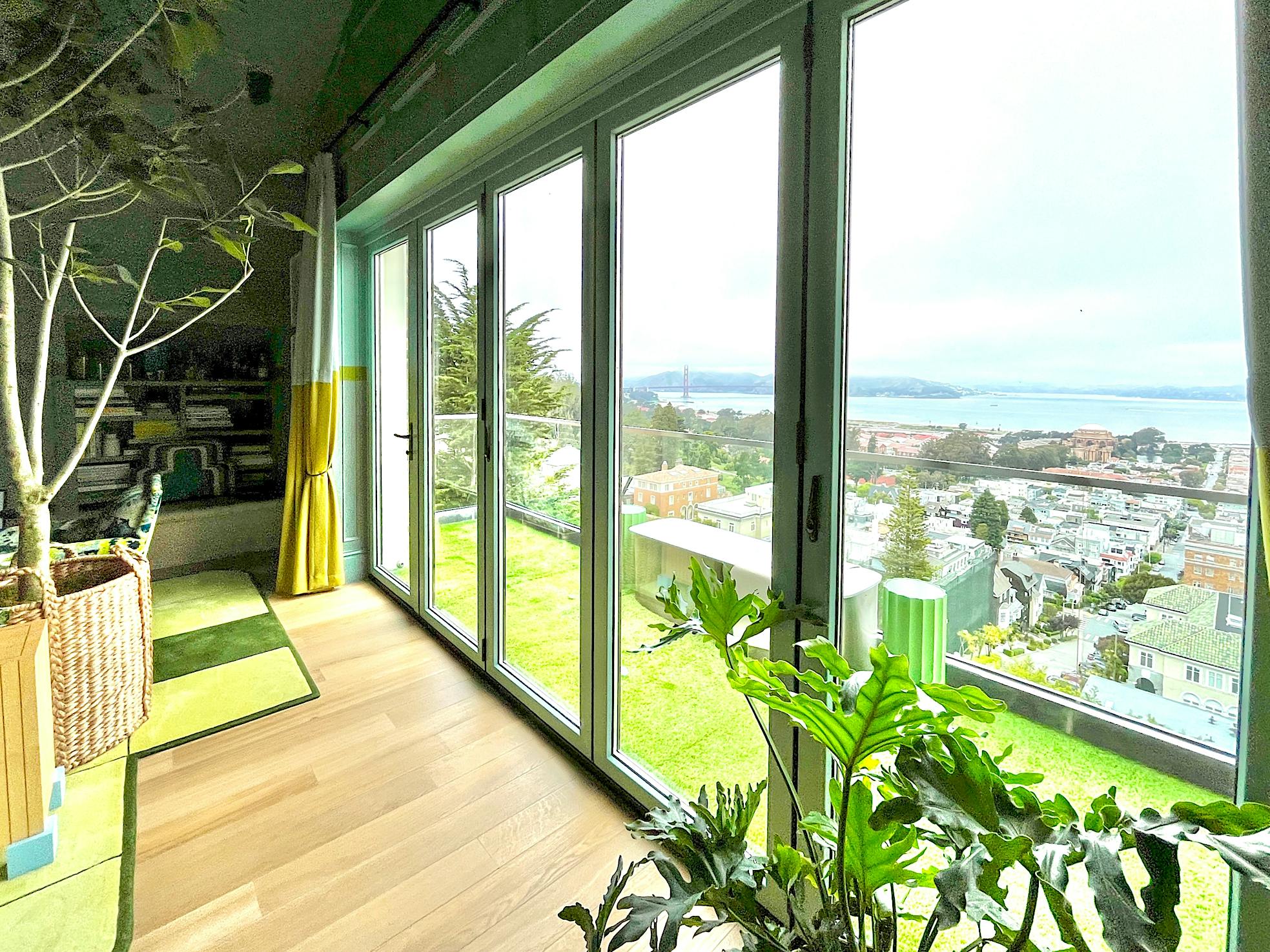 wood framed aluminum clad folding glass wall