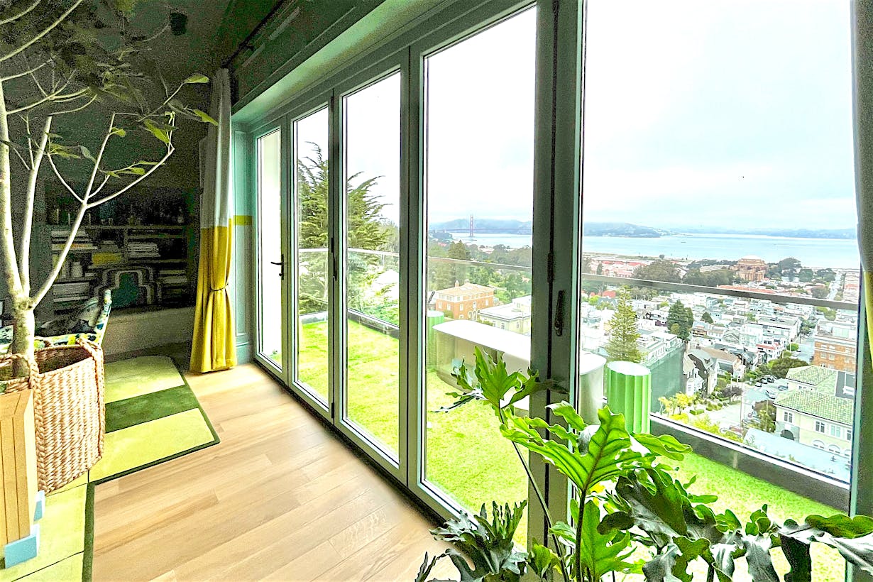 wood framed aluminum clad folding glass wall