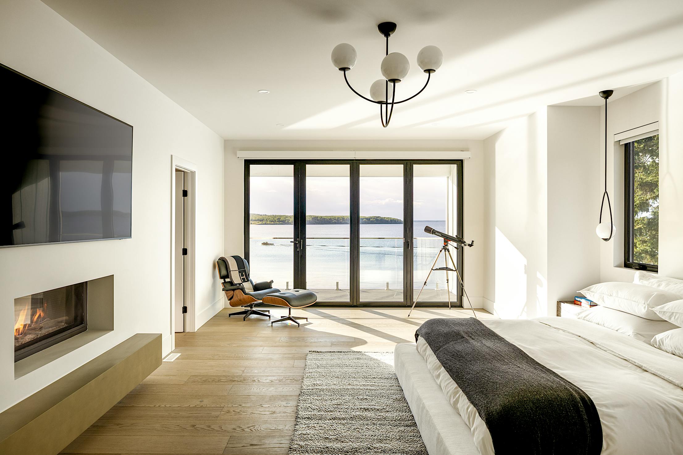 folding glass systems in lakefront home