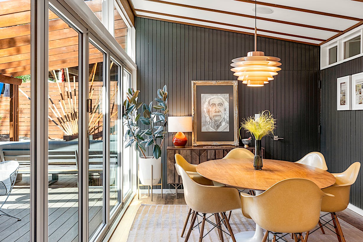 Mid-Century Modern dining room with NanaWall folding glass wall