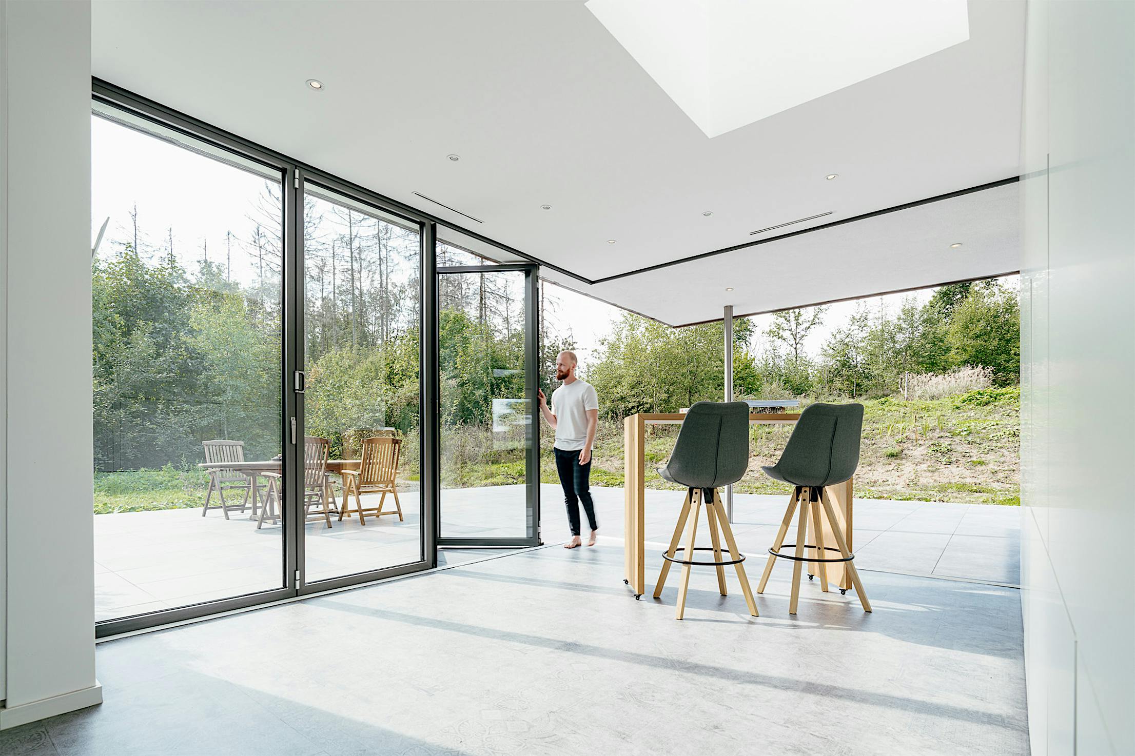 opening glass door system in home office