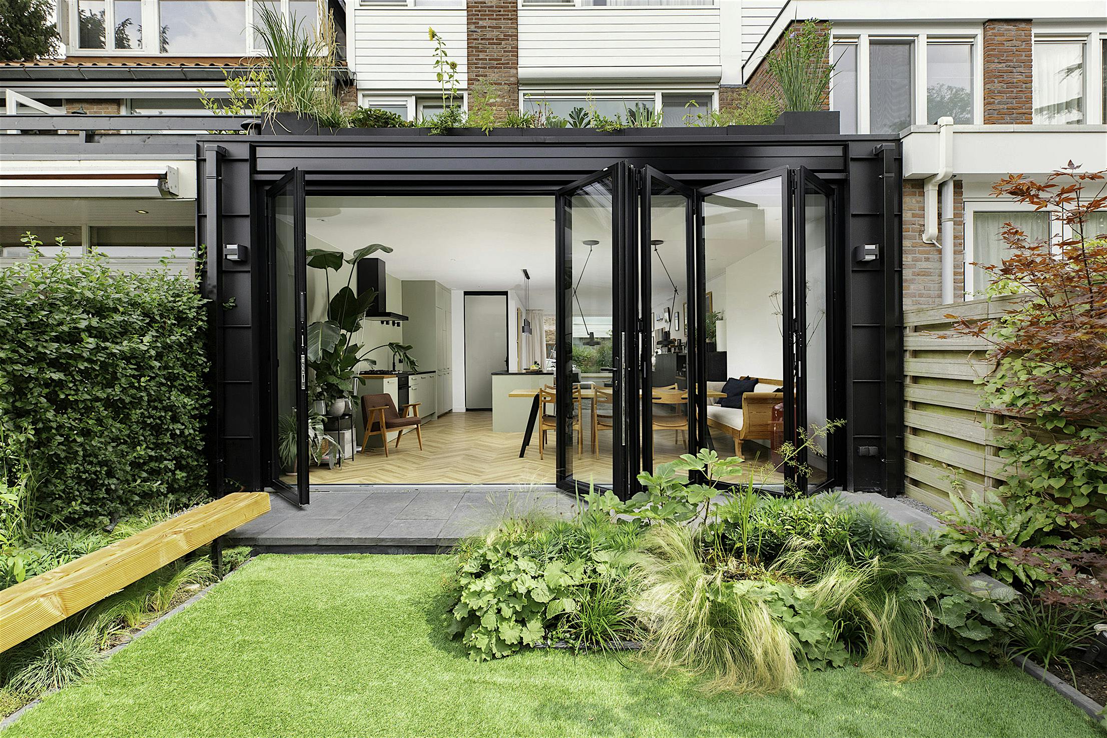 Folding glass walls fresh air daylight sustainable design