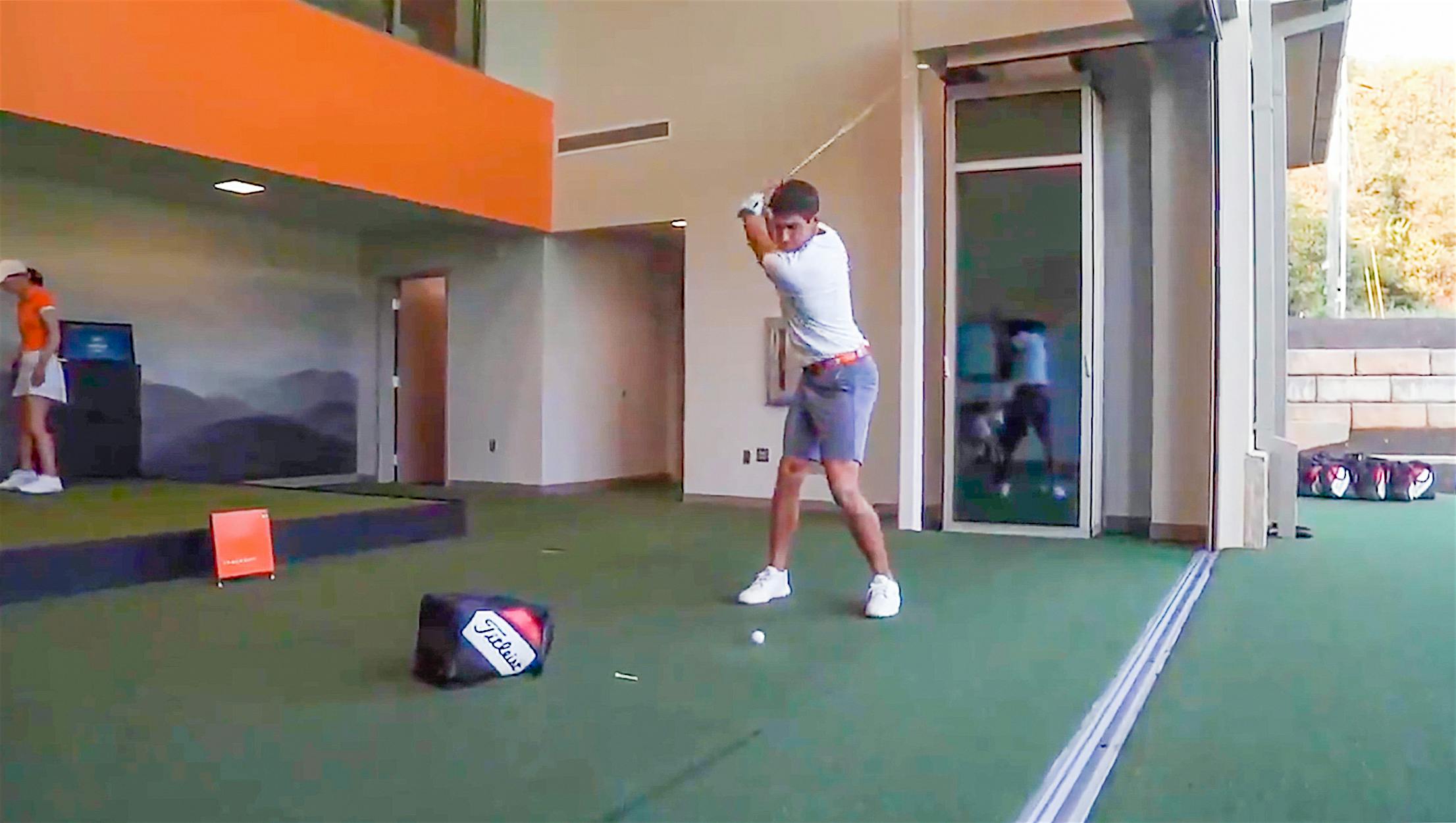 golfer with single track sliding glass wall system