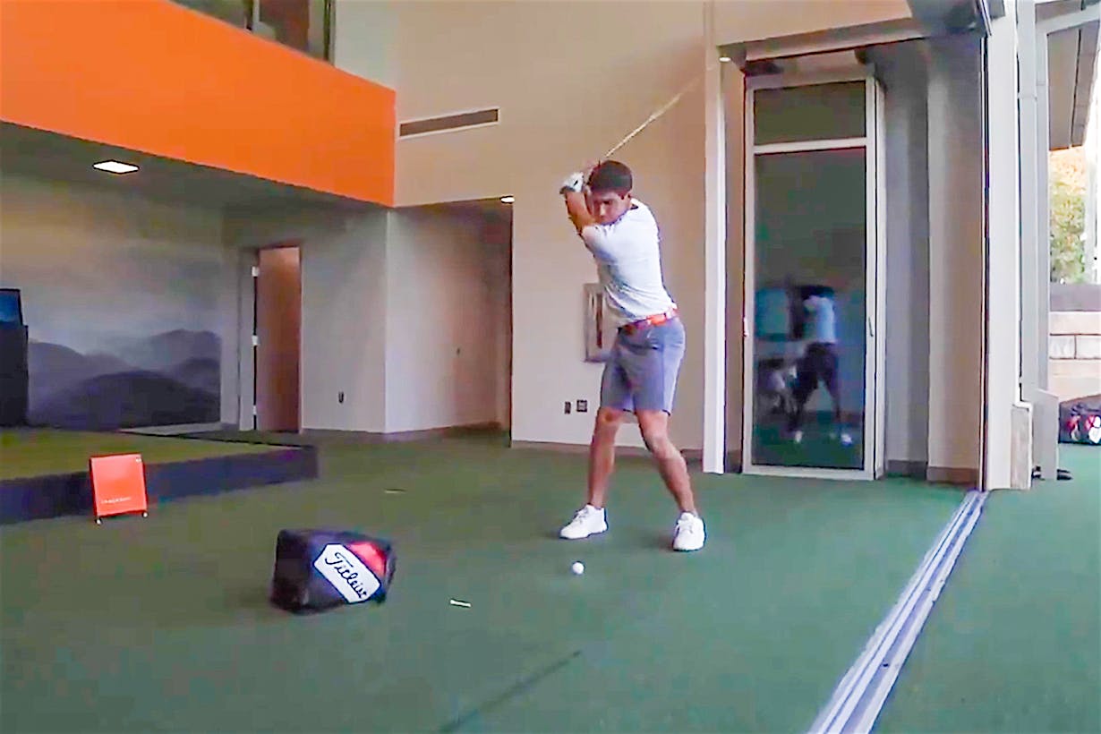 golfer with single track sliding glass wall system