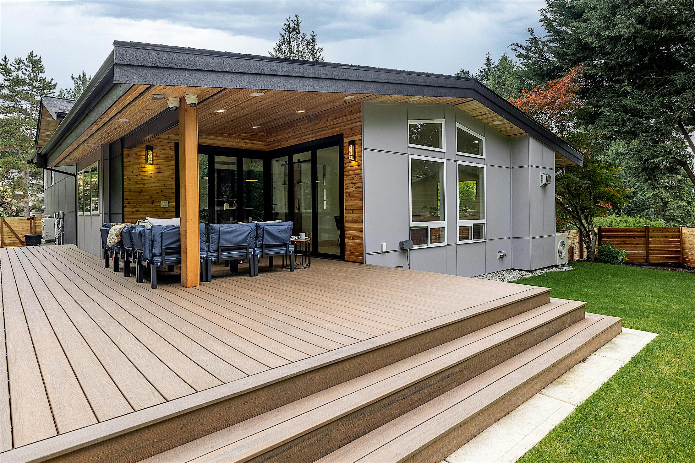 covered outdoor lounge in Pacific Northwest remodel with NanaWall door system
