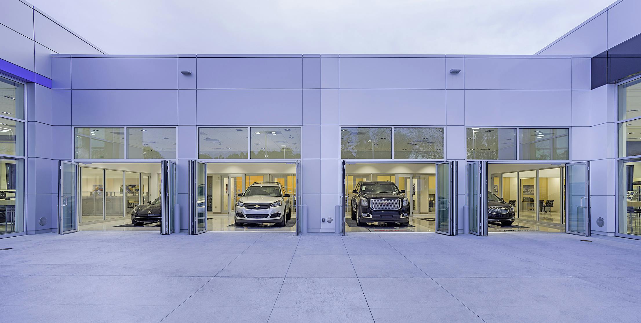 commercial glass doors in auto dealership design