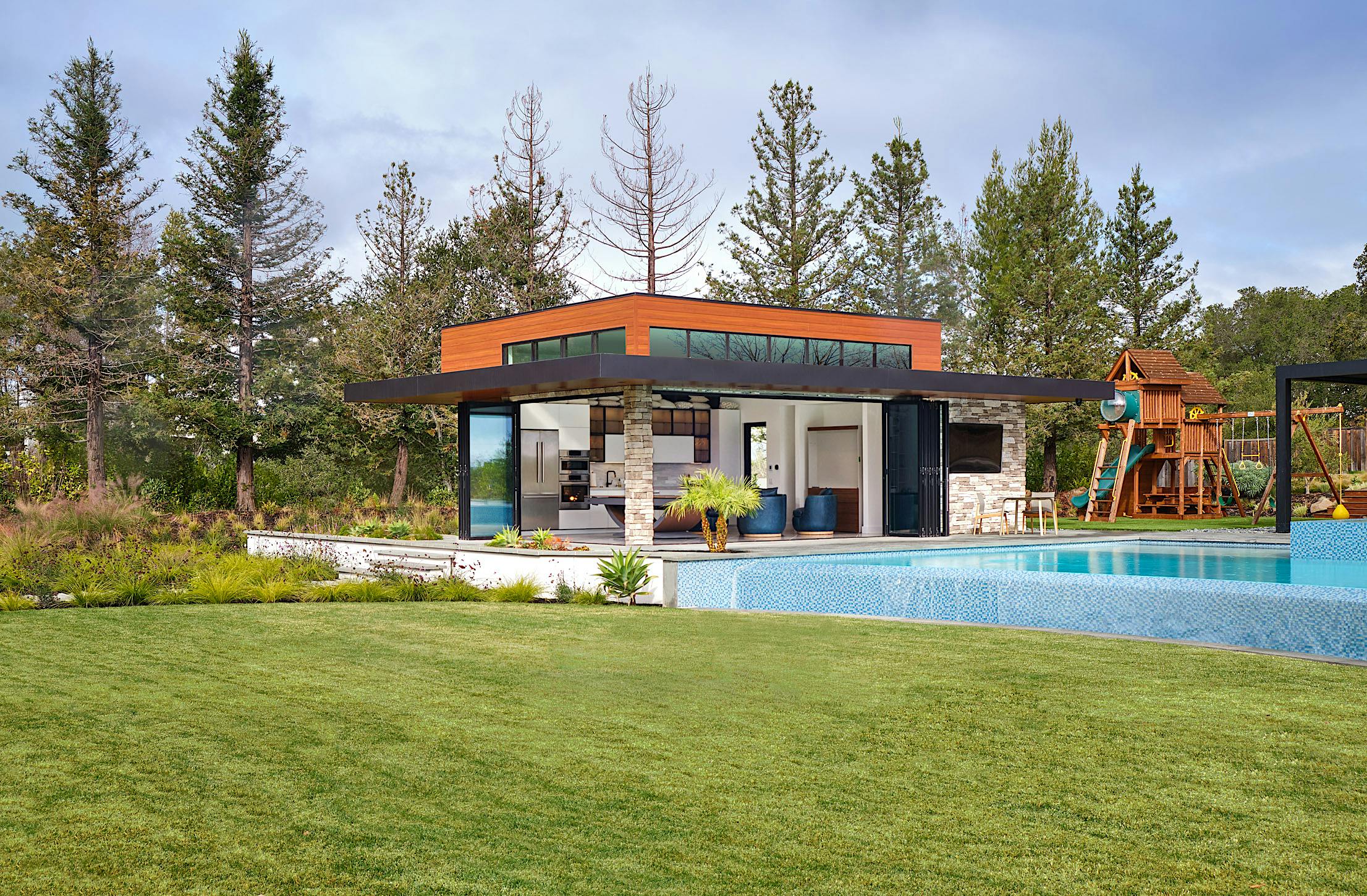 poolhouse with left-right folding glass door panels