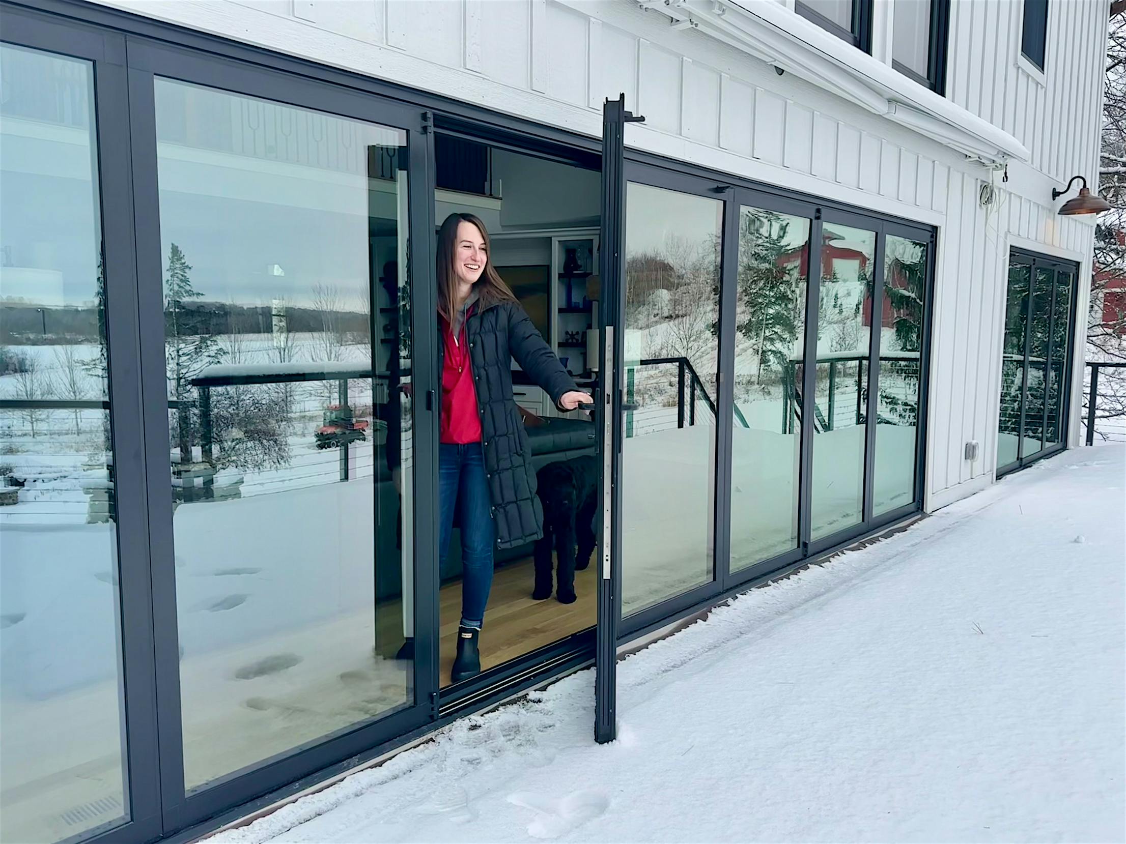 aluminum opening glass doors in snow